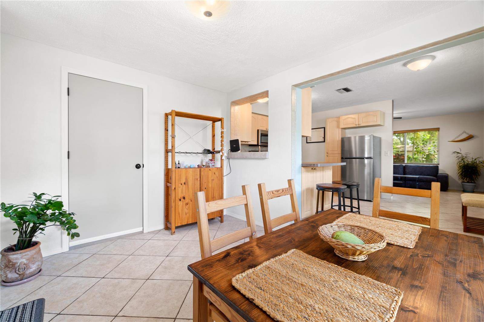 Back flex space can be kept as dining or make into an office or second living space