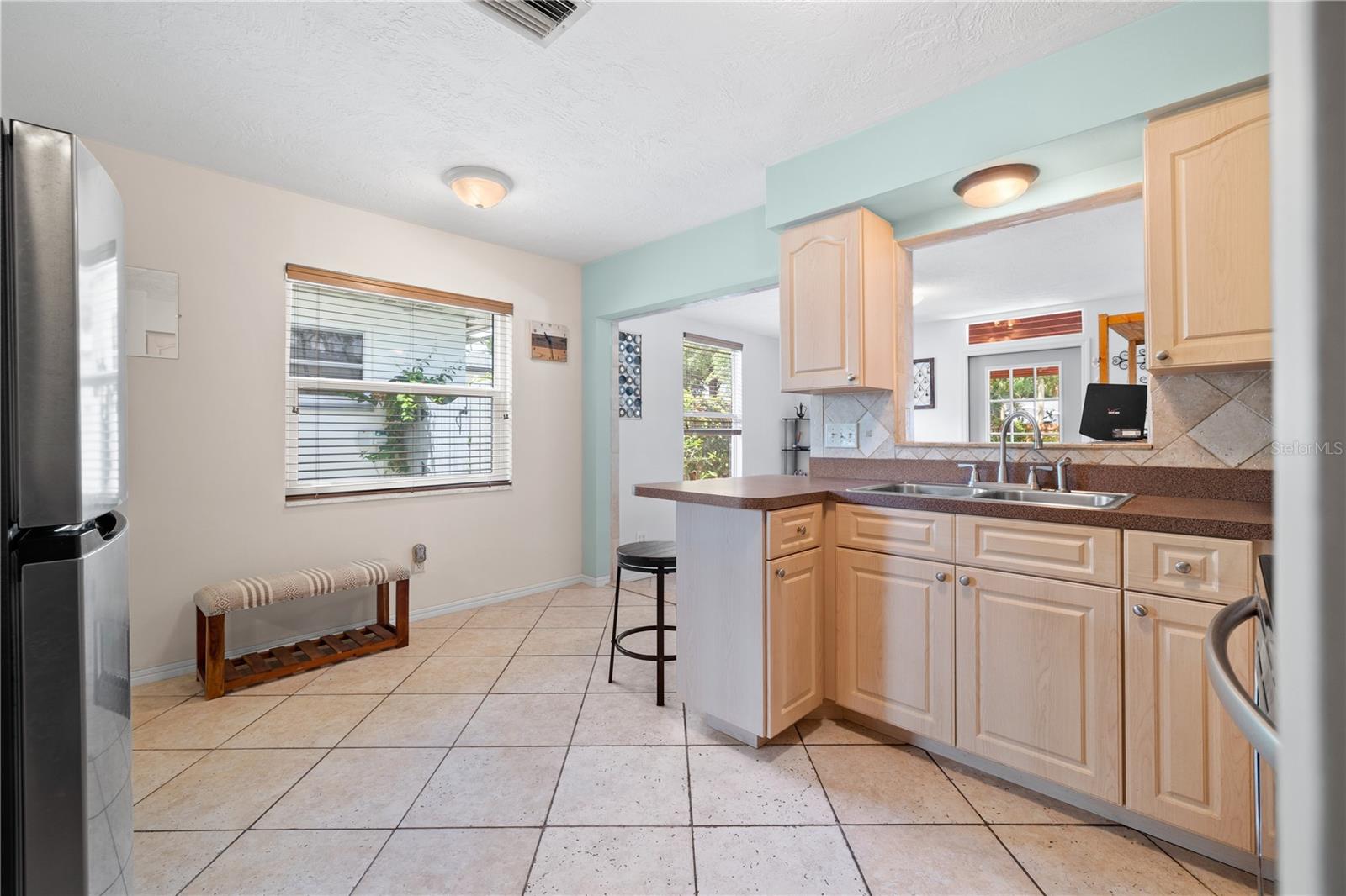 With room for a dining table near the window
