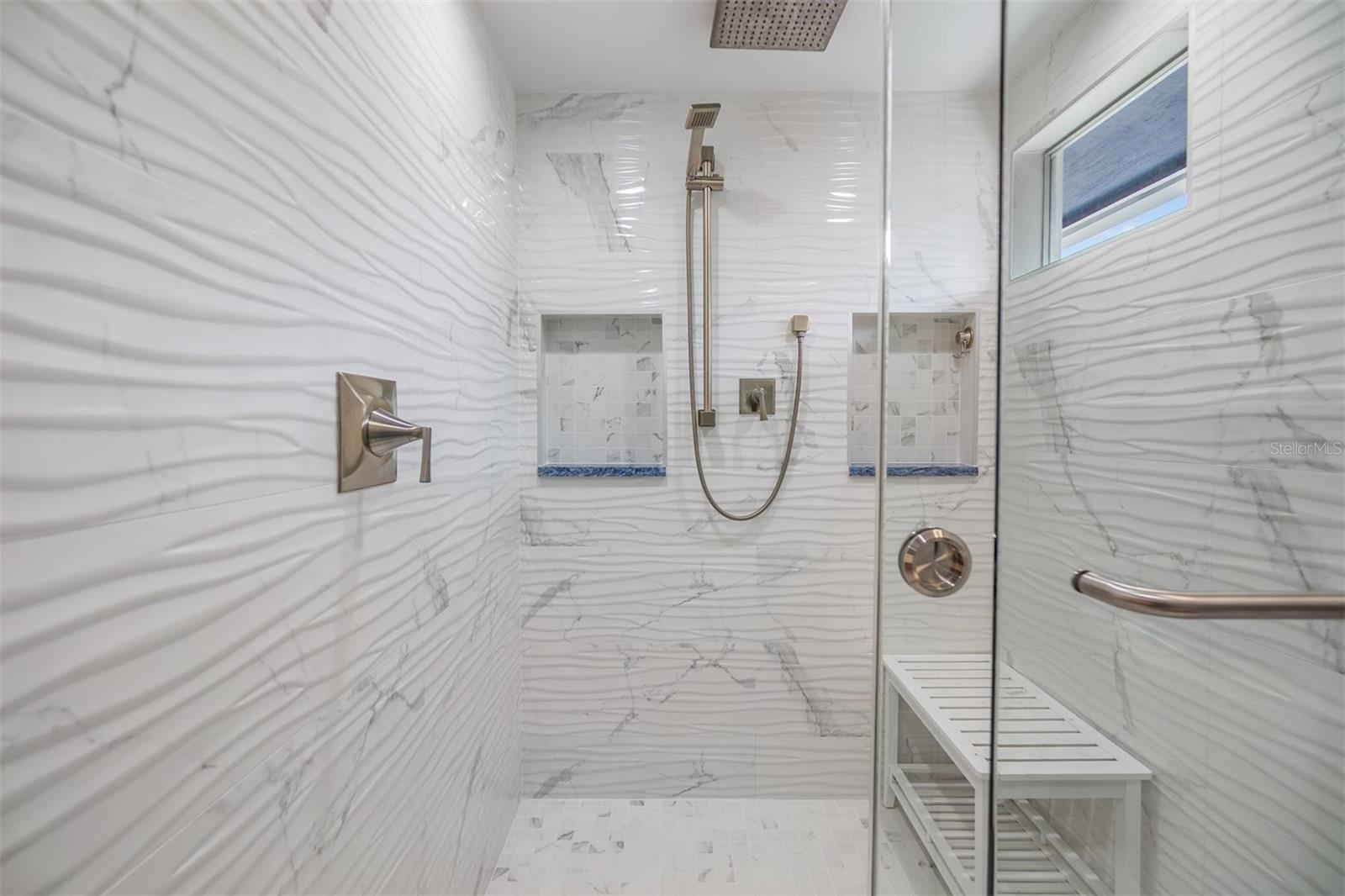 Custom tiled shower in primary bath