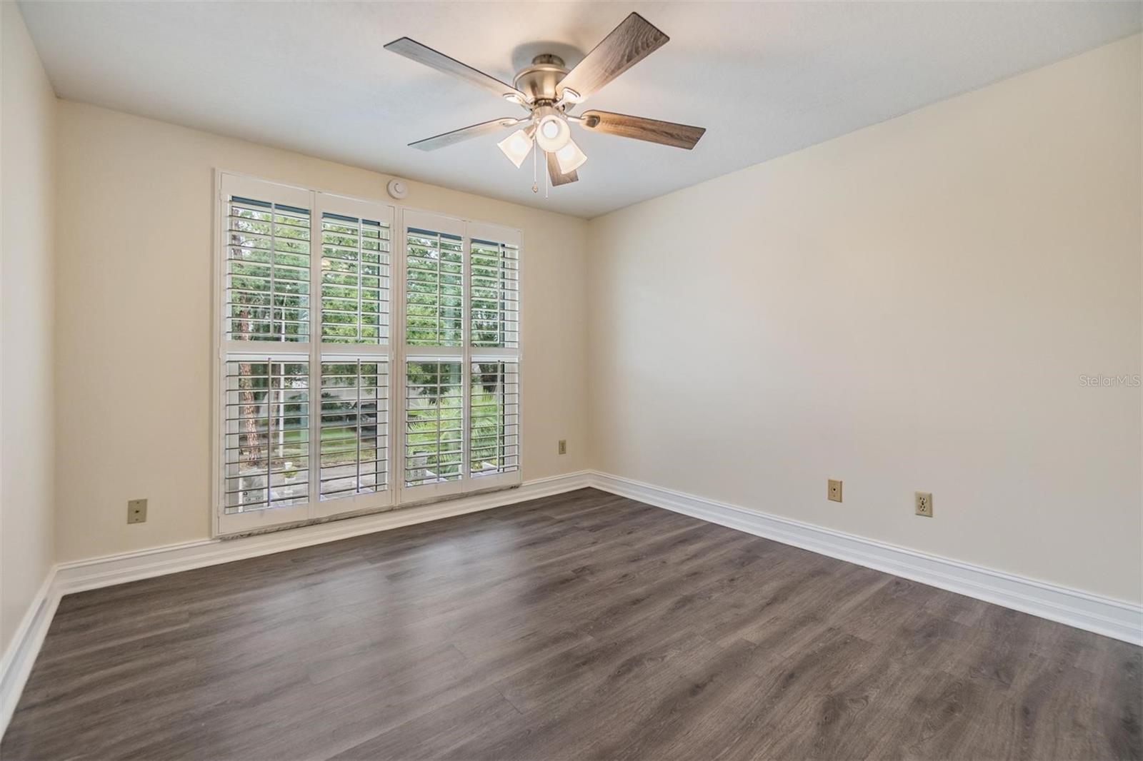 Another bedroom with plantation shutters