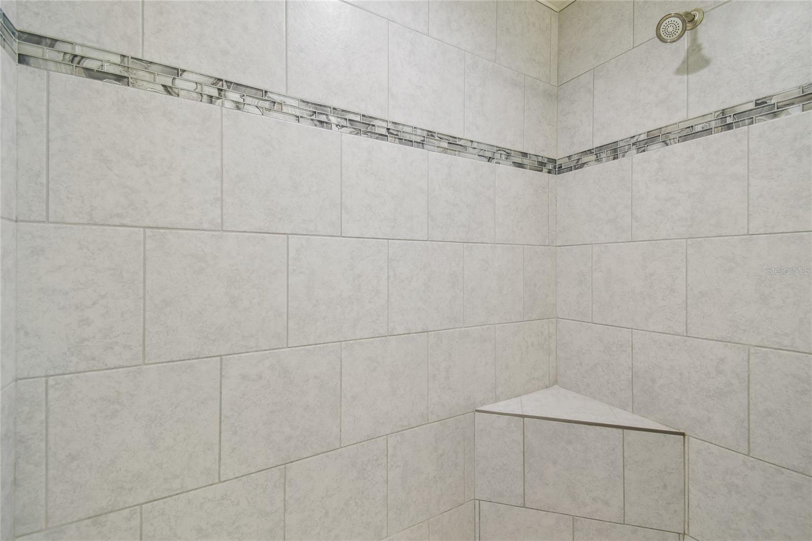 Walk in shower with bench