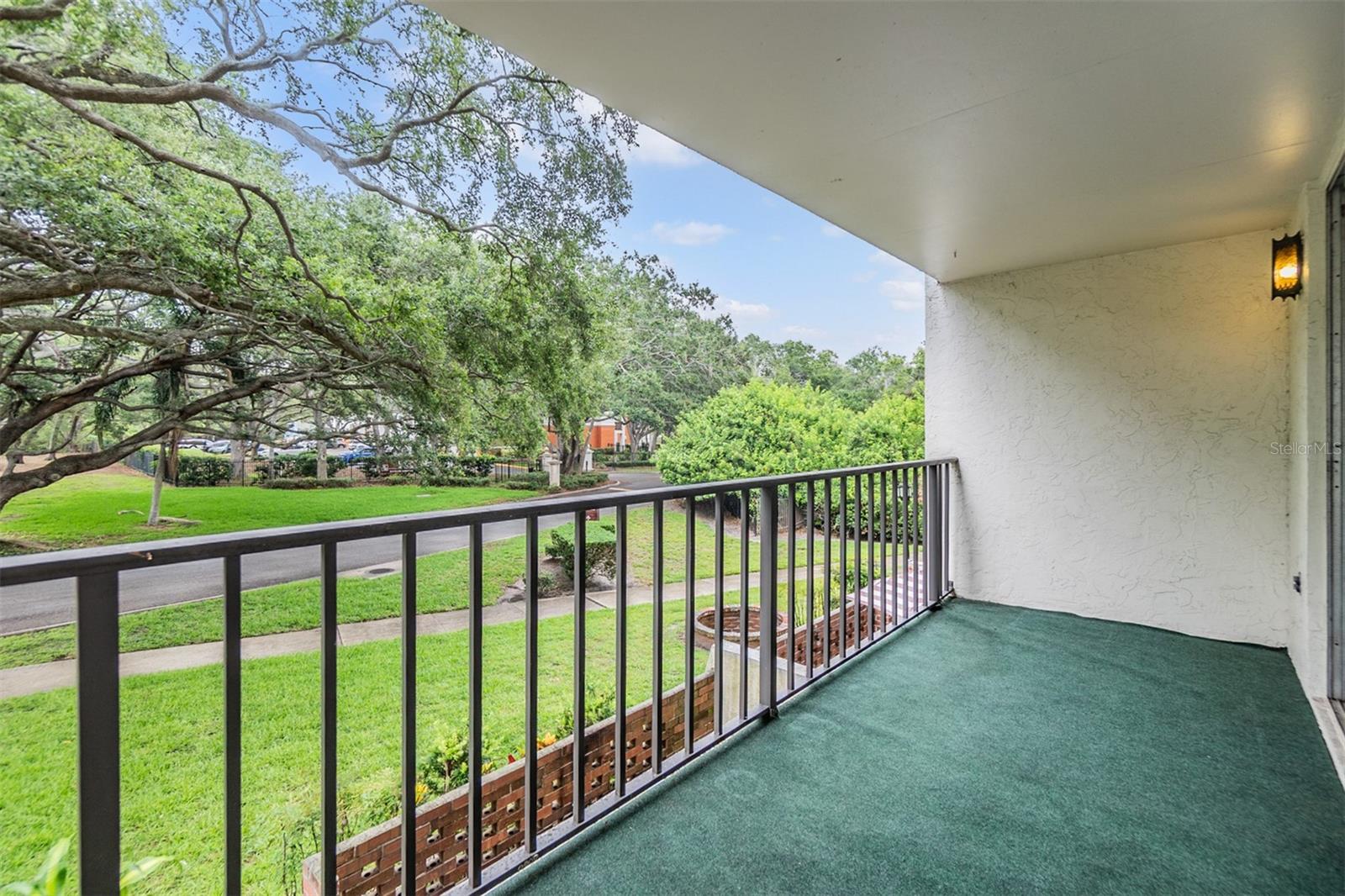 Covered balcony off Primary Bedroom.