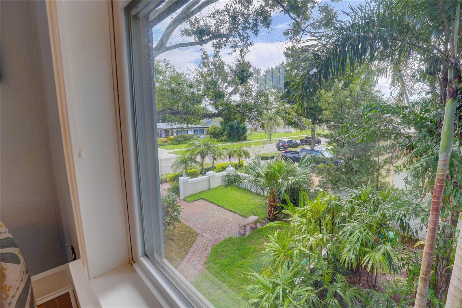 View from bedroom 2 to side yard