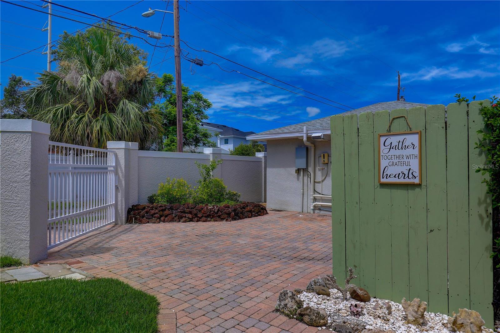 Private driveway for tenant. Gate opens to alley