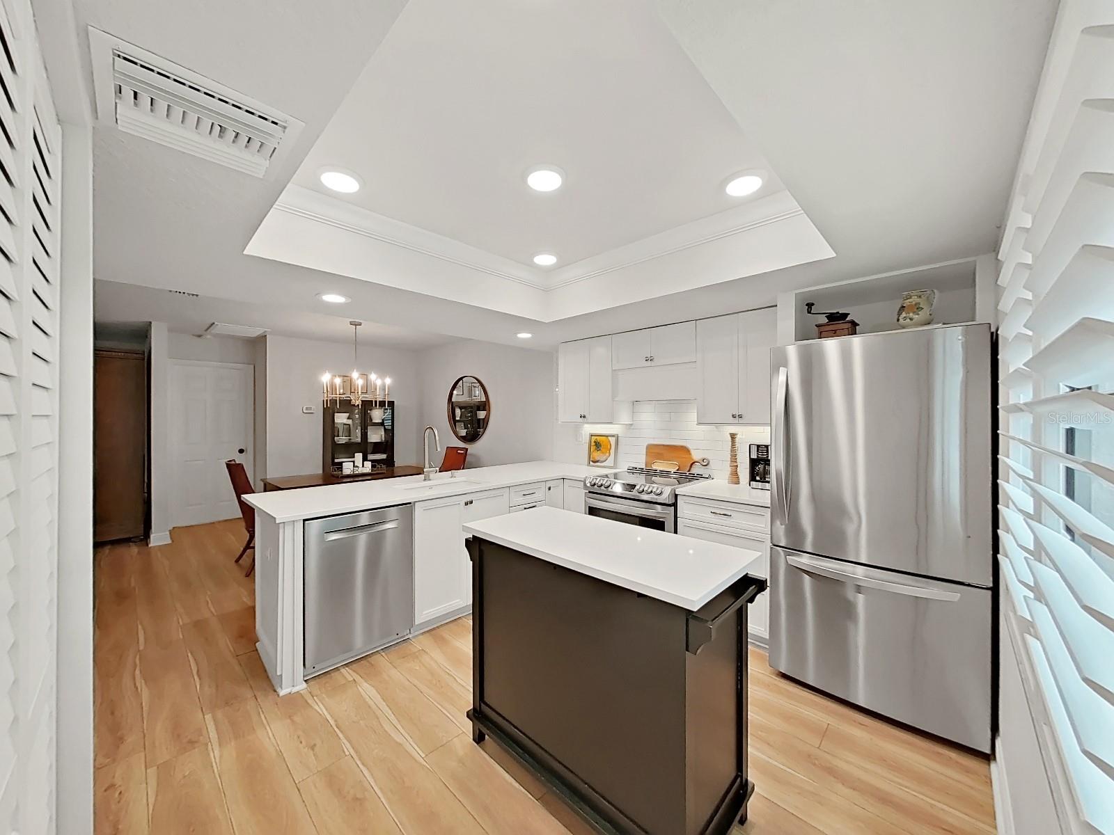 The Kitchen overlooks the adjacent Dining Room.