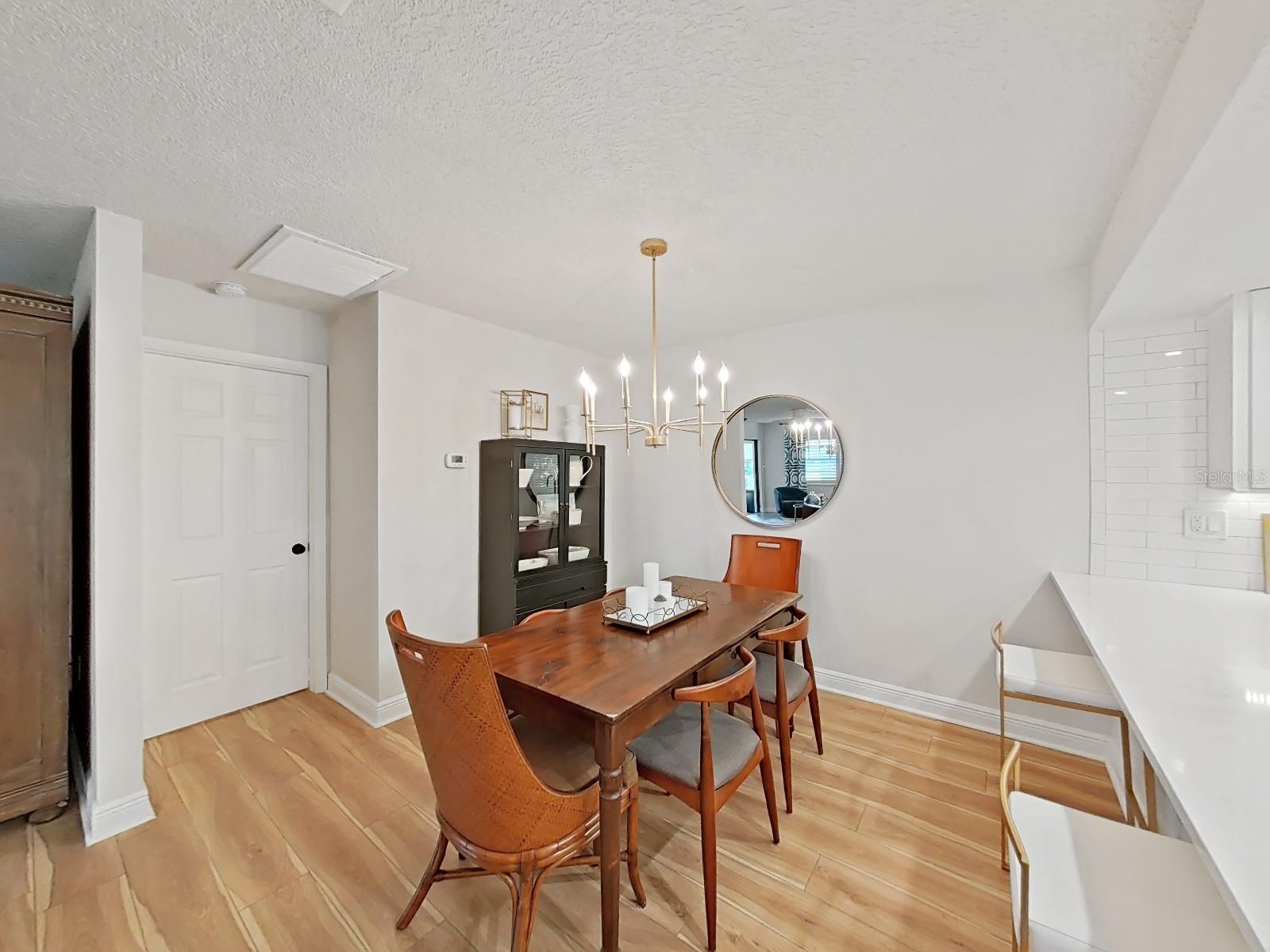 Dining Room with new light fixture.
