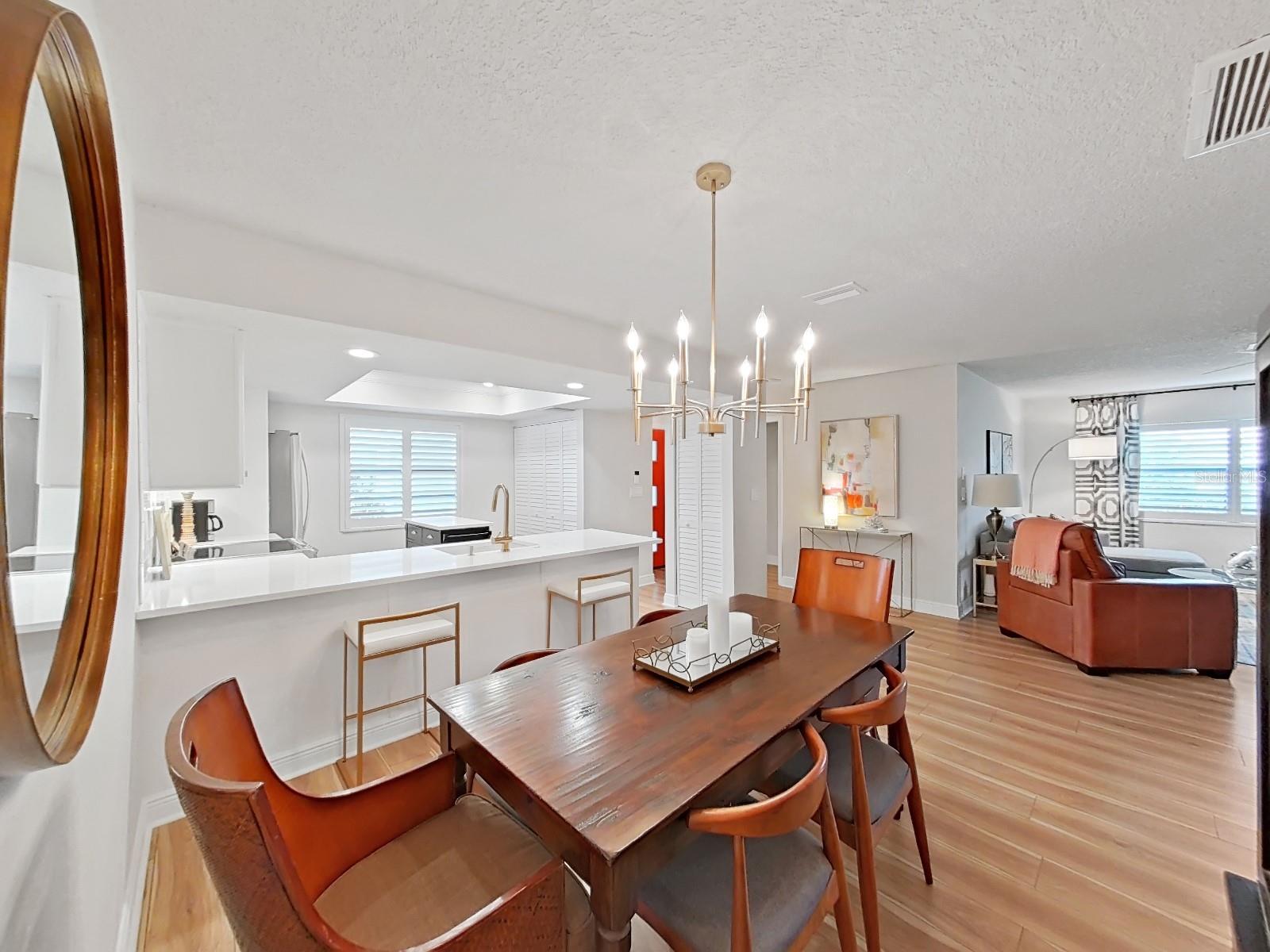 The open concept between the Kitchen, Dining Room, and Living Room allows for effortless entertaining and great flow!