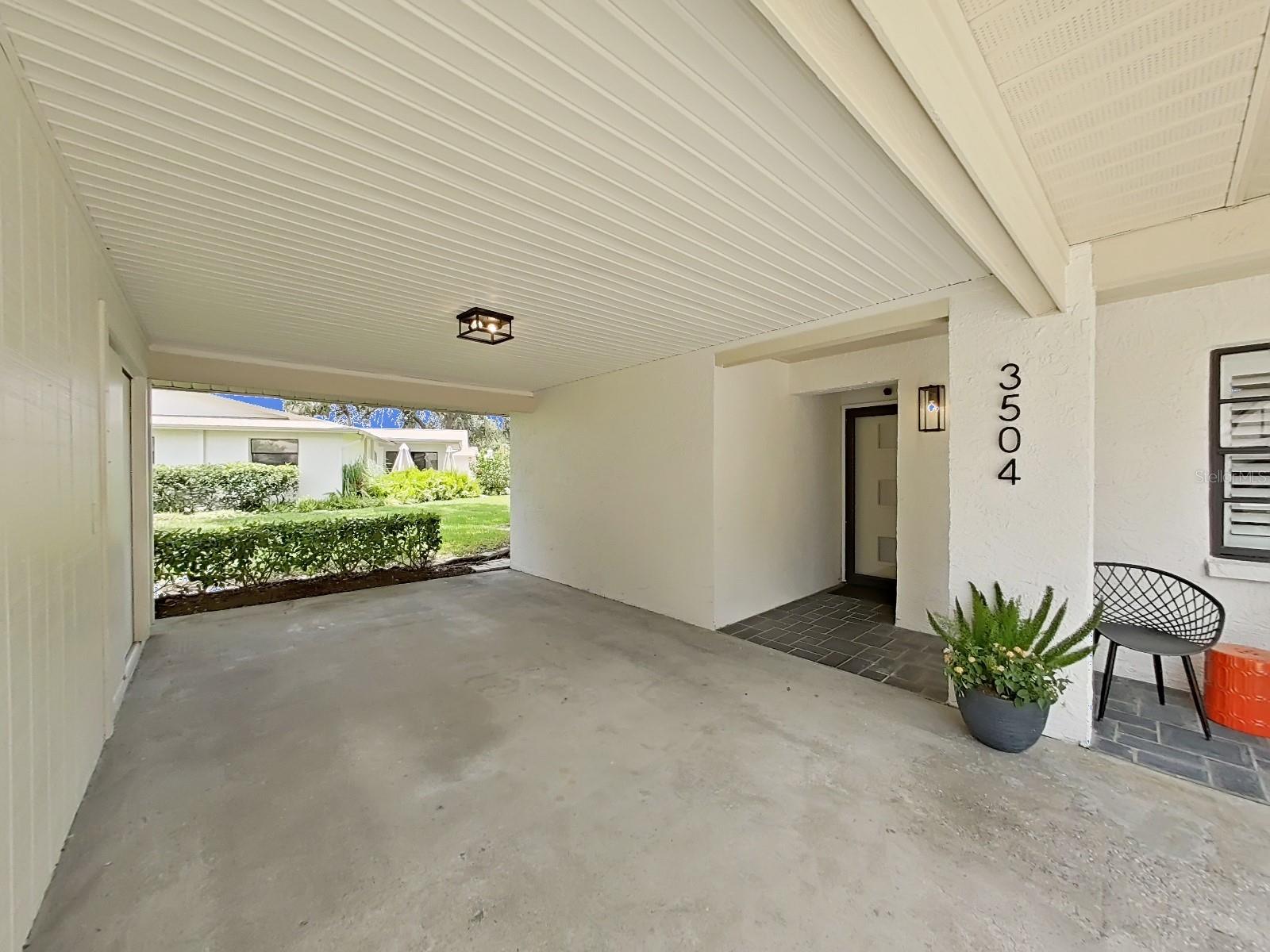 1-Car attached Carport with storage closet