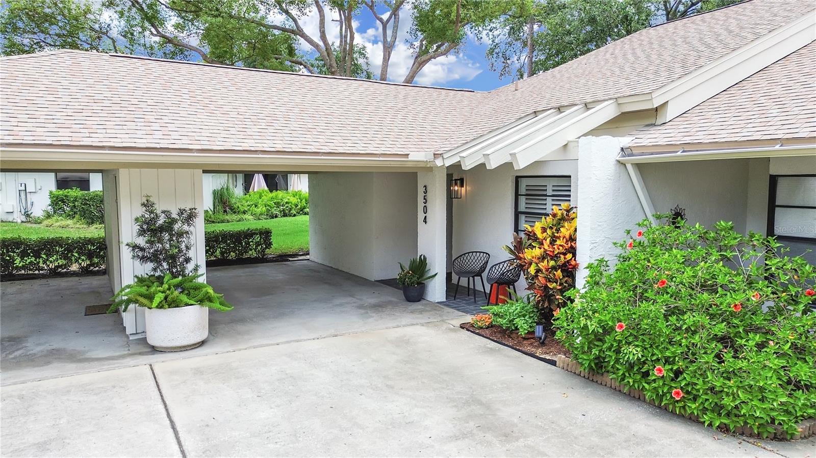 Front of Villa with carport.