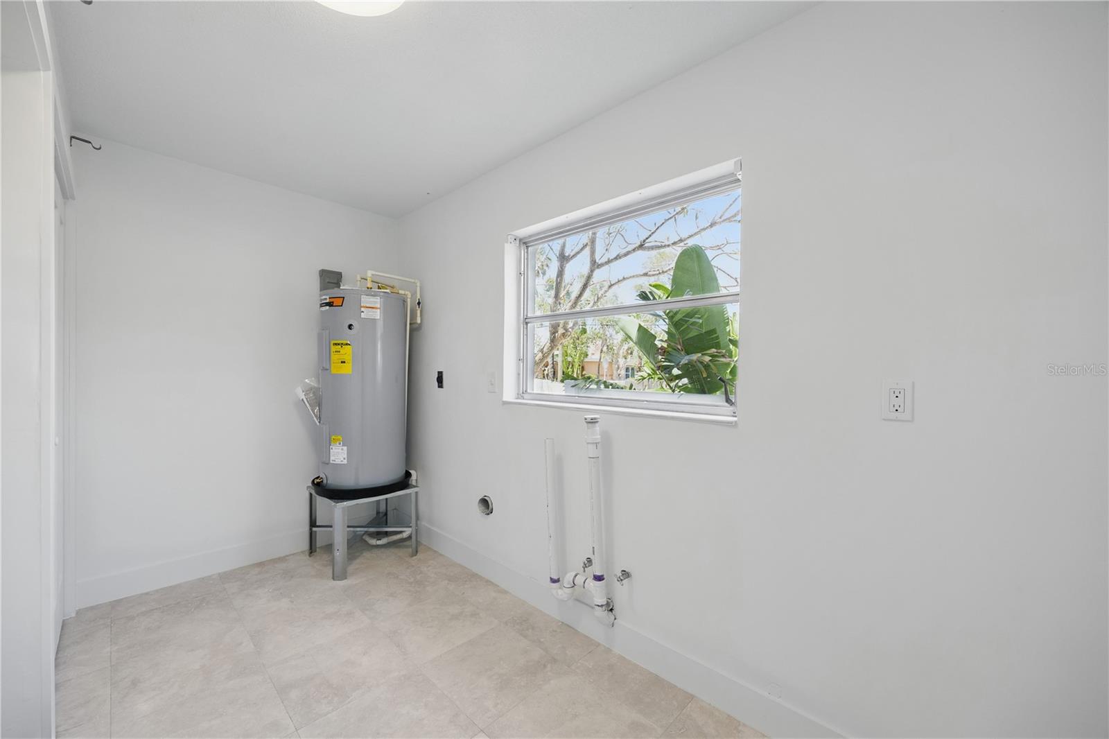 Laundry Room with a closet
