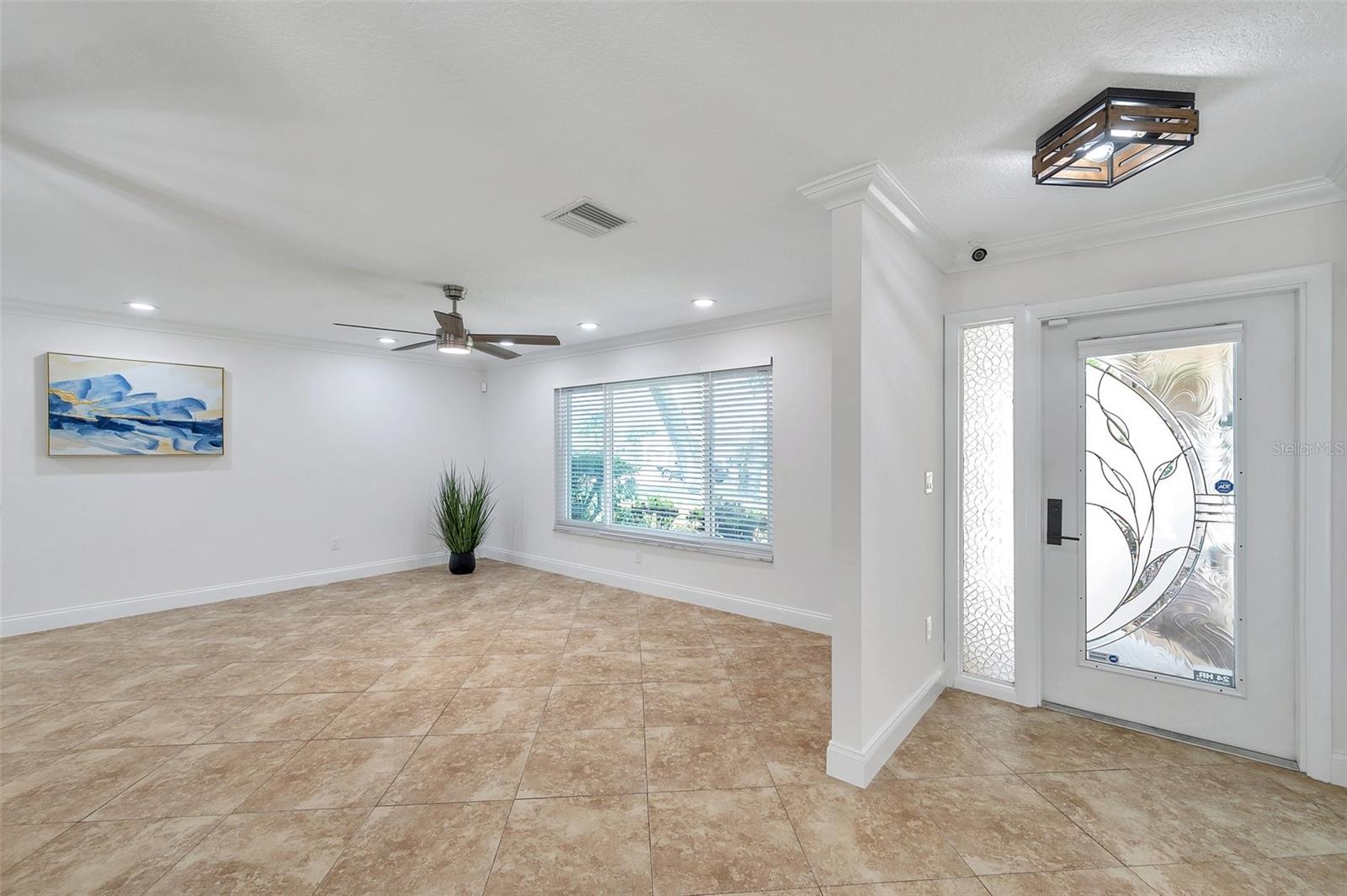 FRONT ENTRY AND LIVING ROOM
