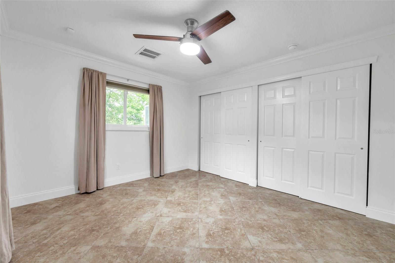 BEDROOM 2 WITH EXTRA WIDE BUILT IN CLOSETS