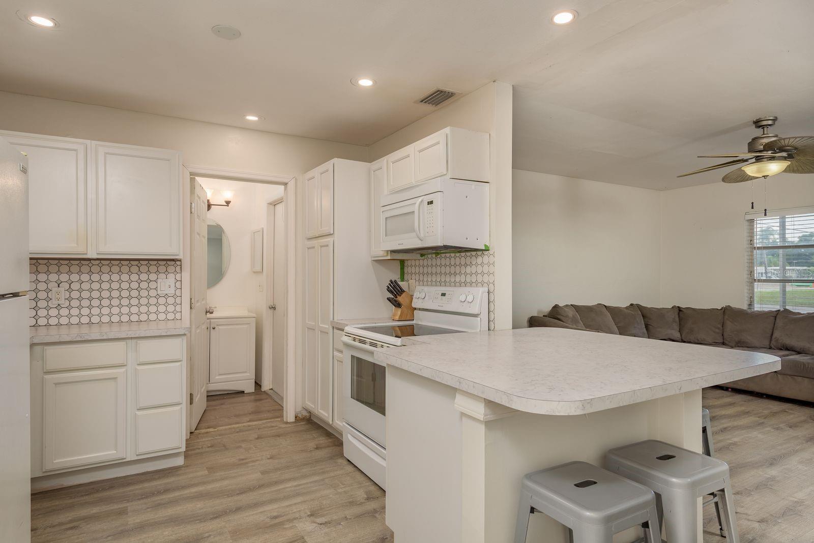2nd full bath is located off the kitchen.