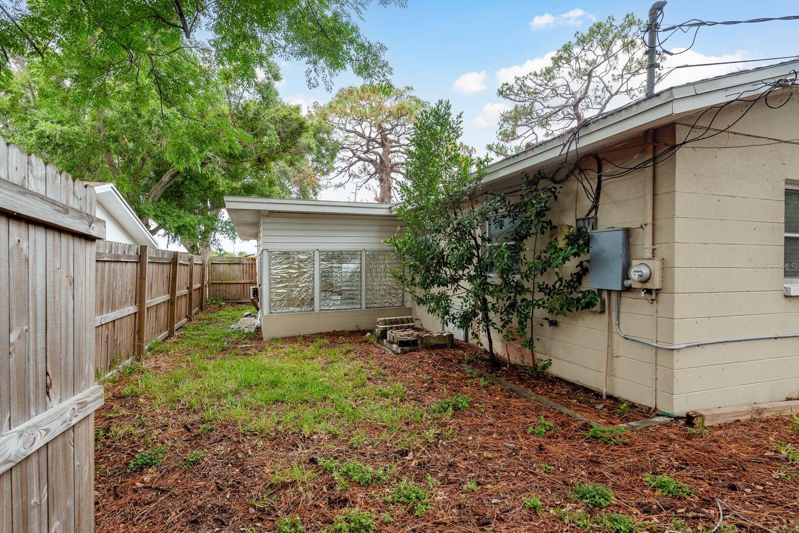 Fenced back yard.