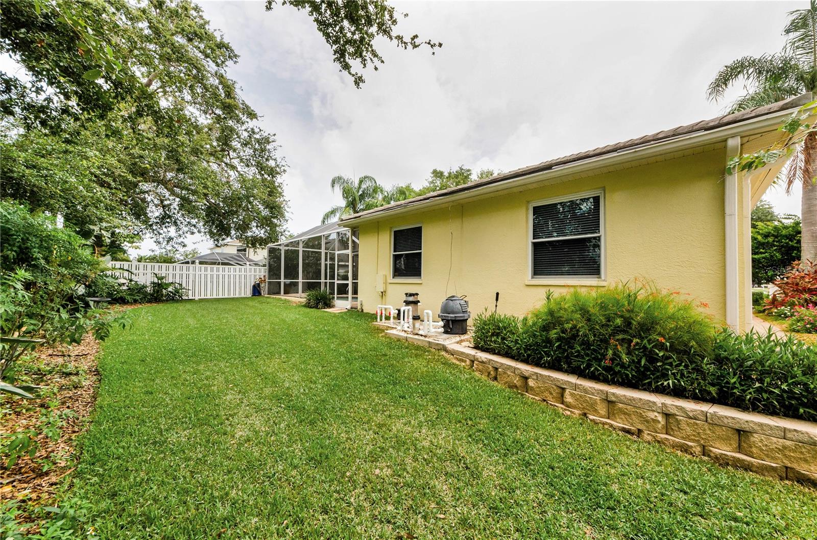 Side yard beautifully landscaped.