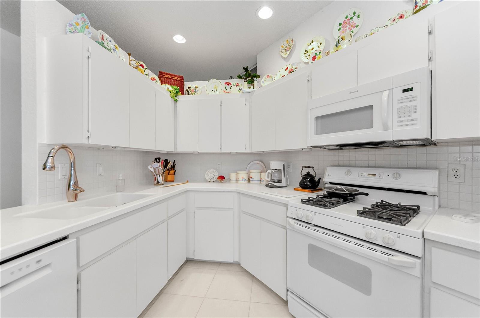 Updated Appliances including with exception of natural gas range that runs like a top!  Instant hot water services this home.