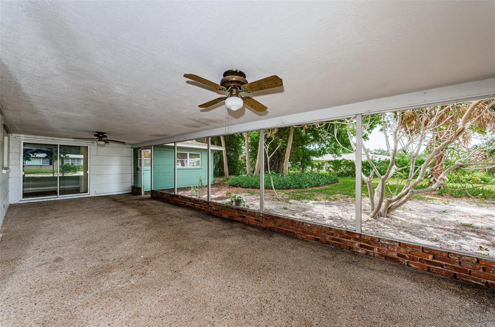 444sf screened lanai large enough for a dining table and separate conversation area.