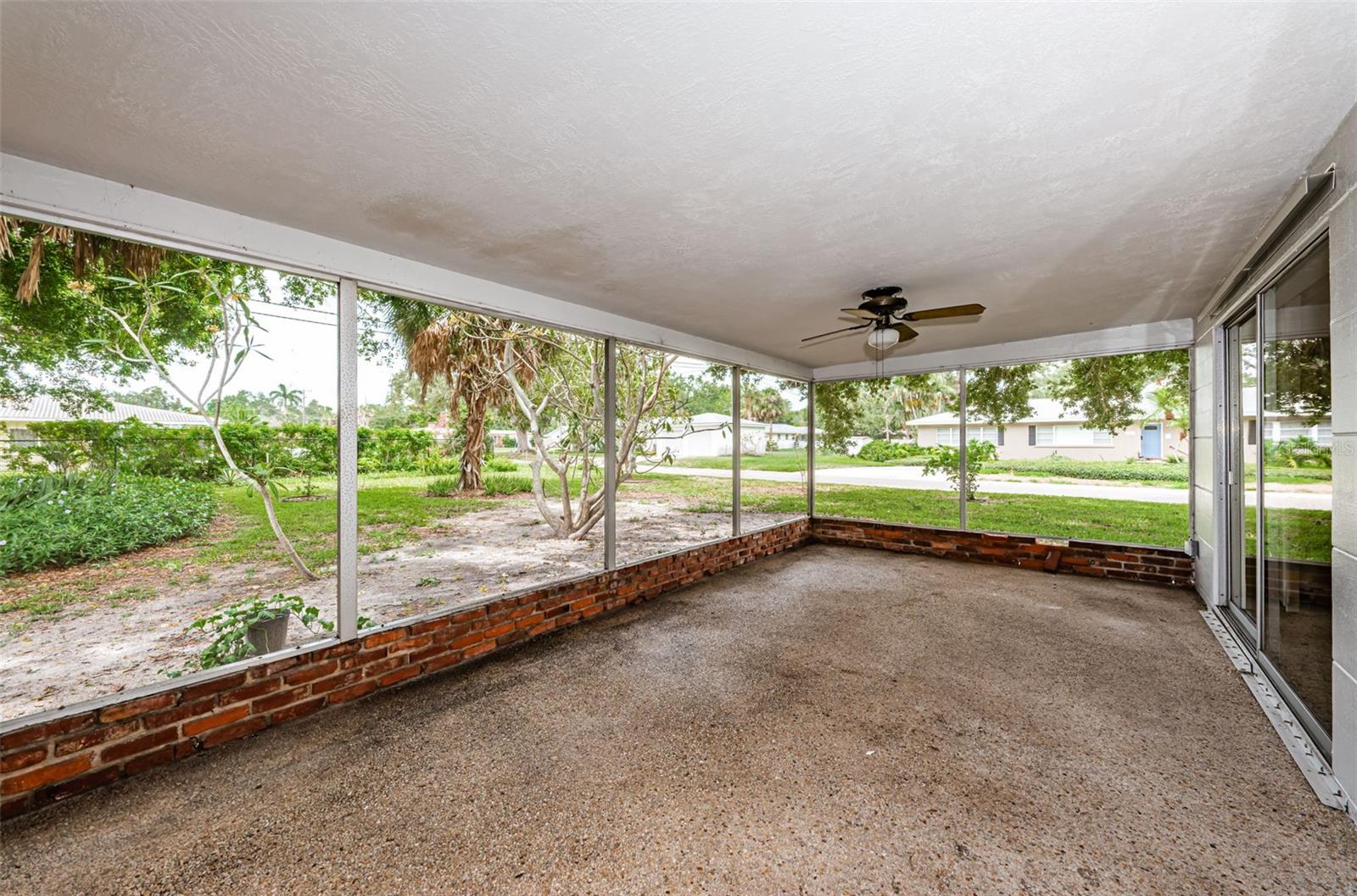 444sf screened lanai large enough for a dining table and separate conversation area.