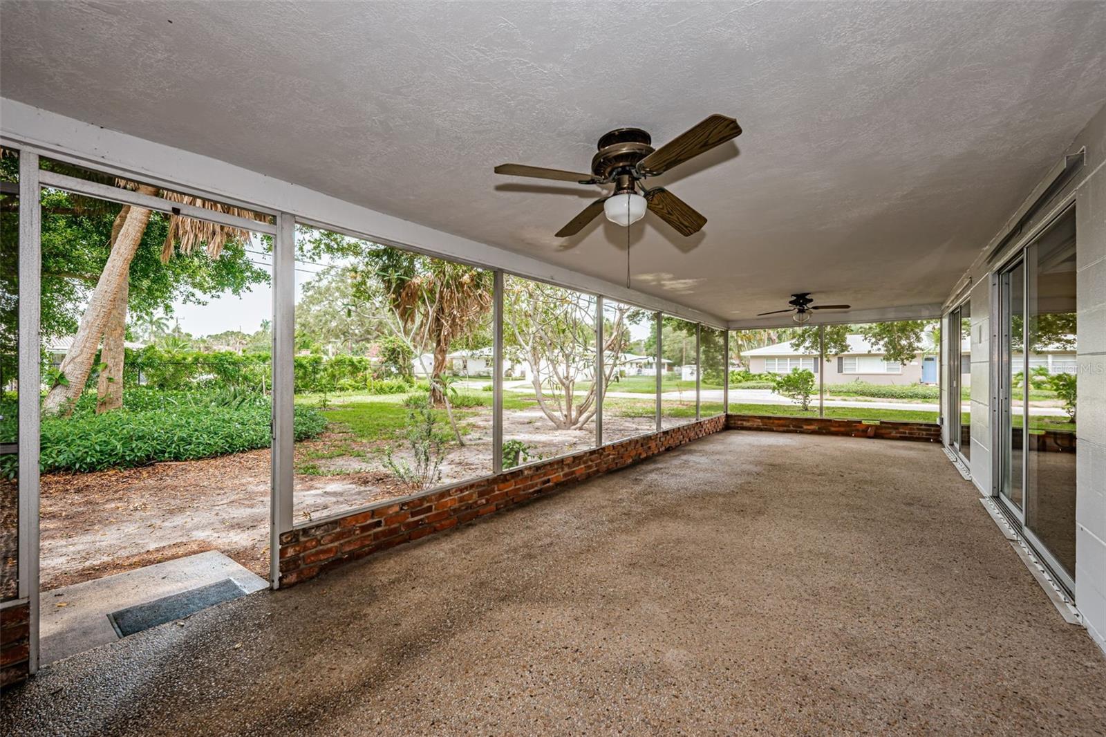 444sf screened lanai large enough for a dining table and separate conversation area.