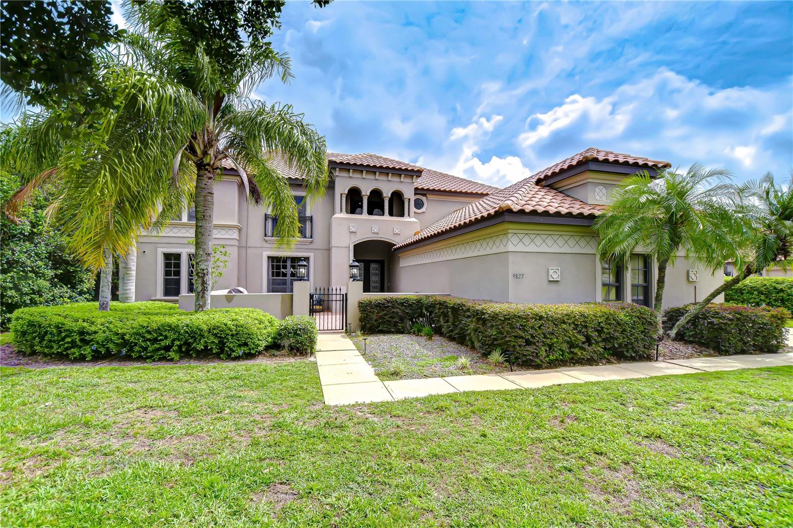 Perfectly positioned on a scenic spring-fed lake in the gated community of Toulon!