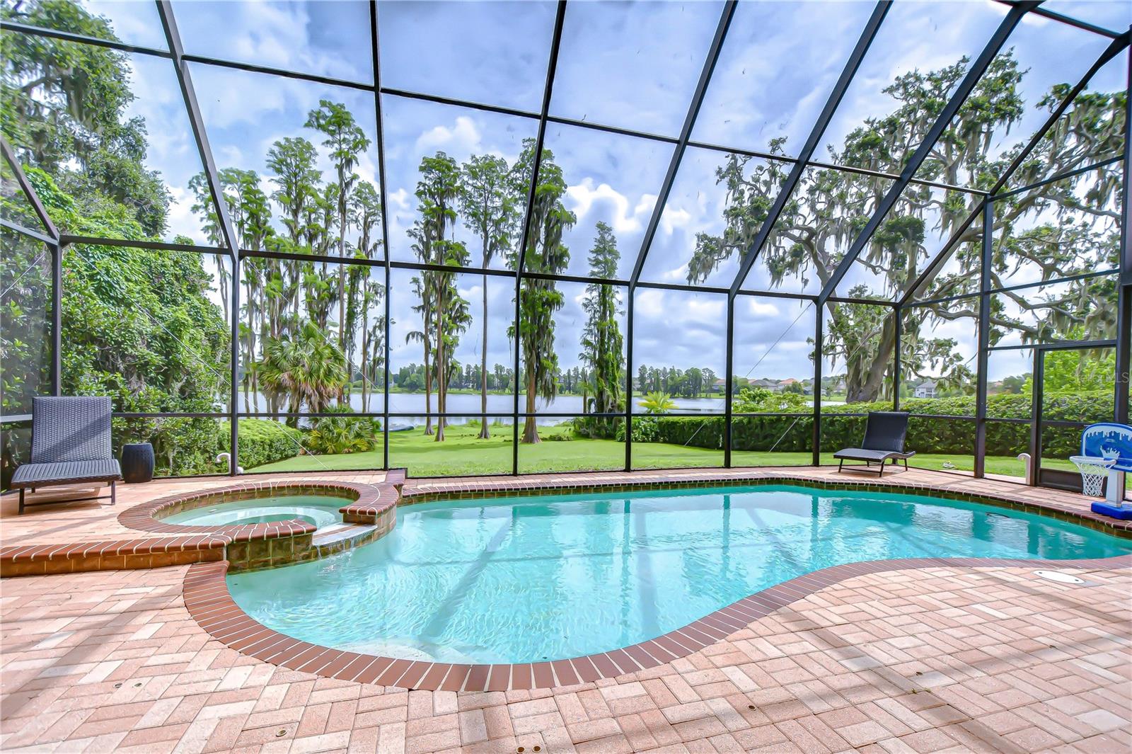 This sparkling salt-water heated pool is ready for the family to enjoy all year long!