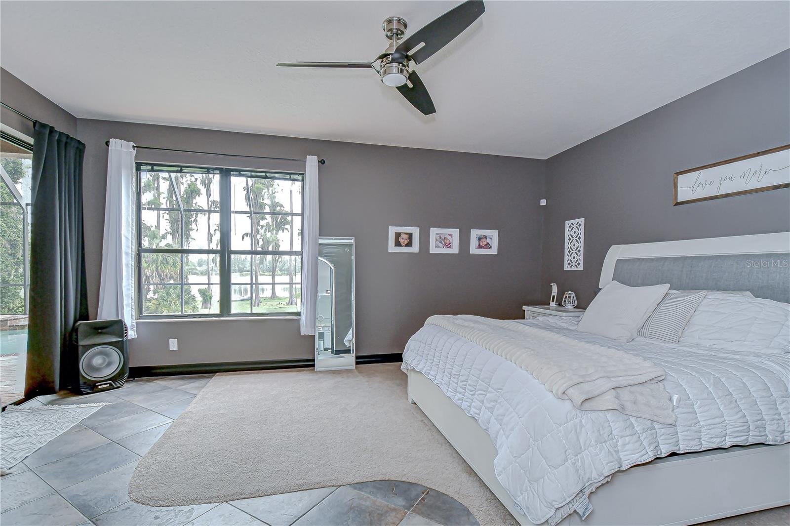 Owner is treated with lanai access and tranquil lake views.