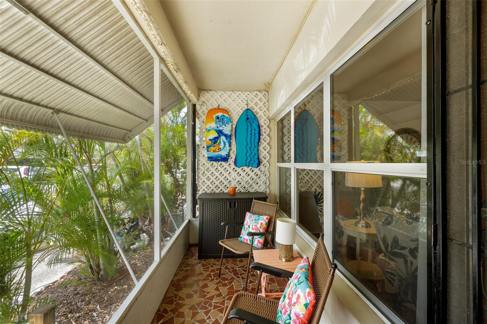 The private screened front porch is perfect for morning coffee or evening chats.