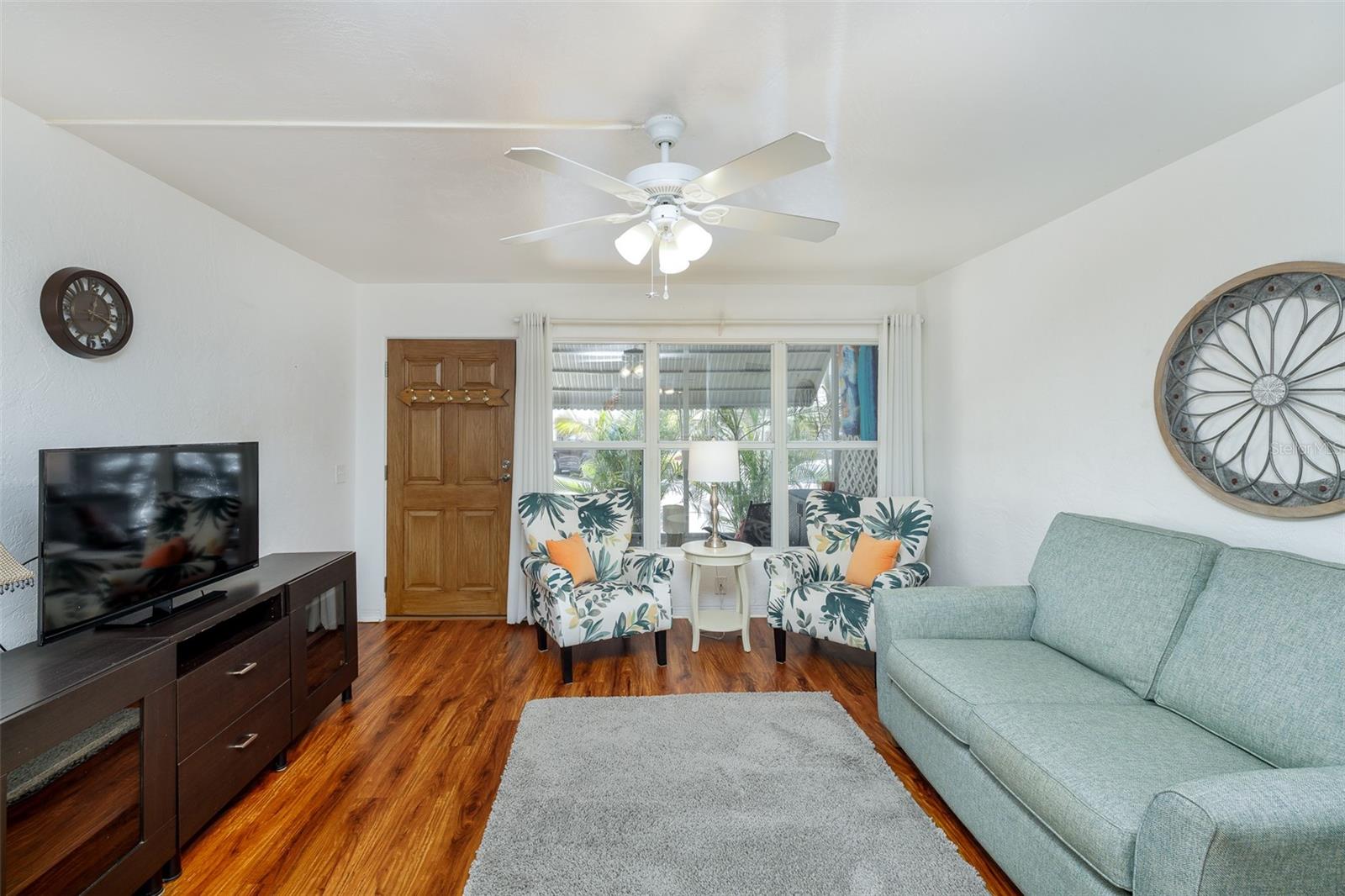 Whether watching your favorite show or hosting friends, this living room is set up for both comfort and style, with thoughtfully chosen furnishings and a functional layout.