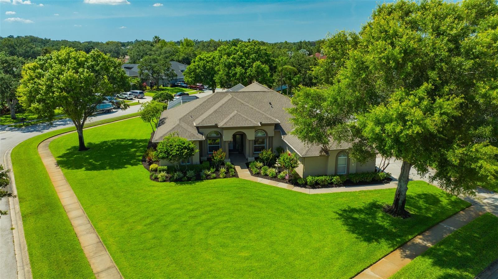 Huge Corner Lot w/ Meticulously Maintained & Lush Landscaping All Around!