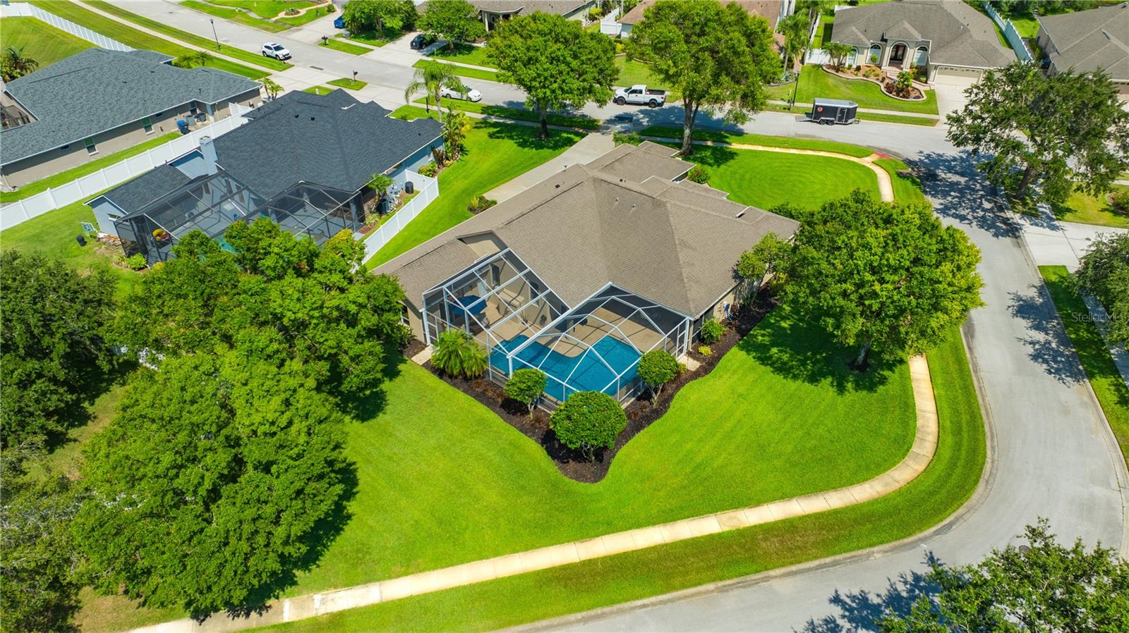 Huge Corner Lot w/ Meticulously Maintained & Lush Landscaping All Around!