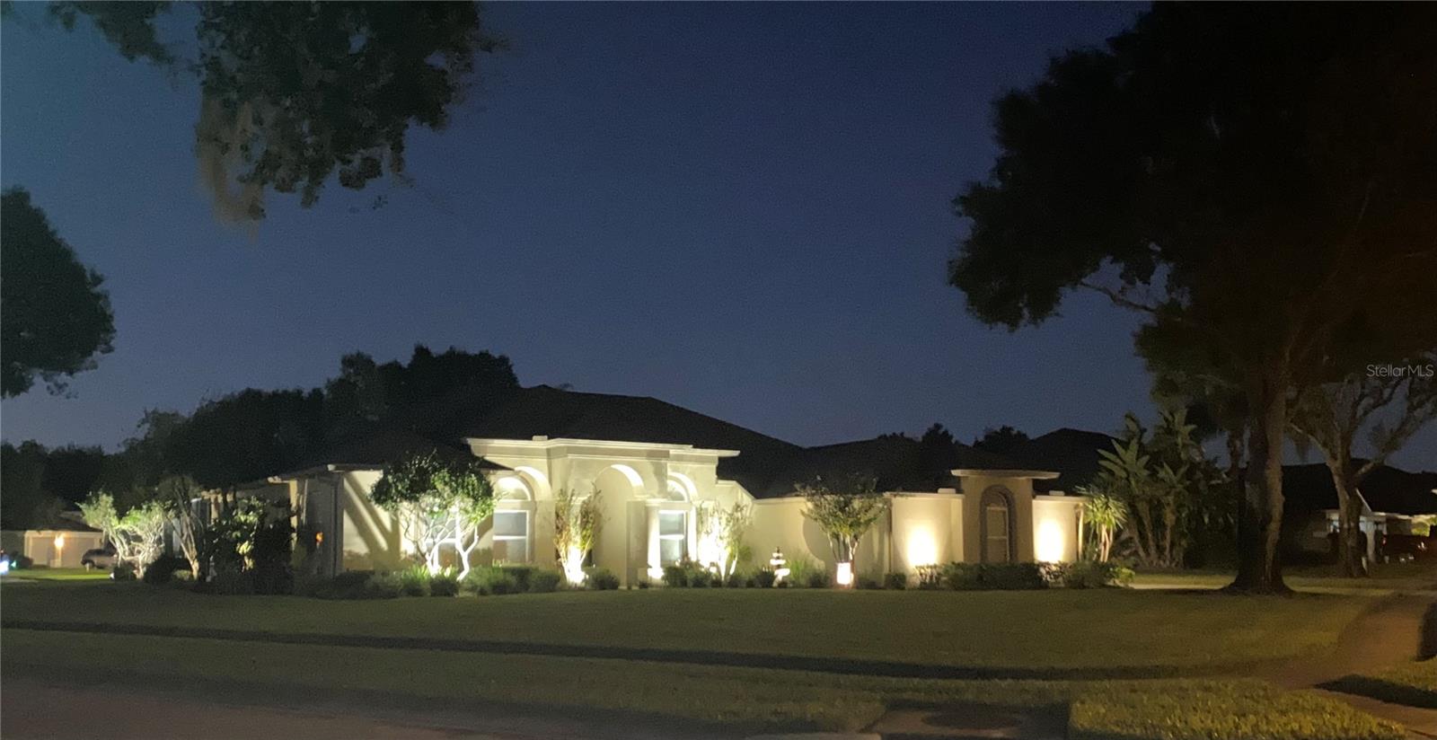 The property shines at night with gorgeous uplighting!