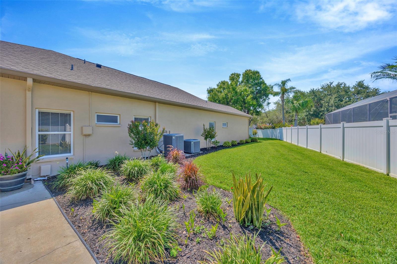 Huge Corner Lot w/ Meticulously Maintained & Lush Landscaping All Around!