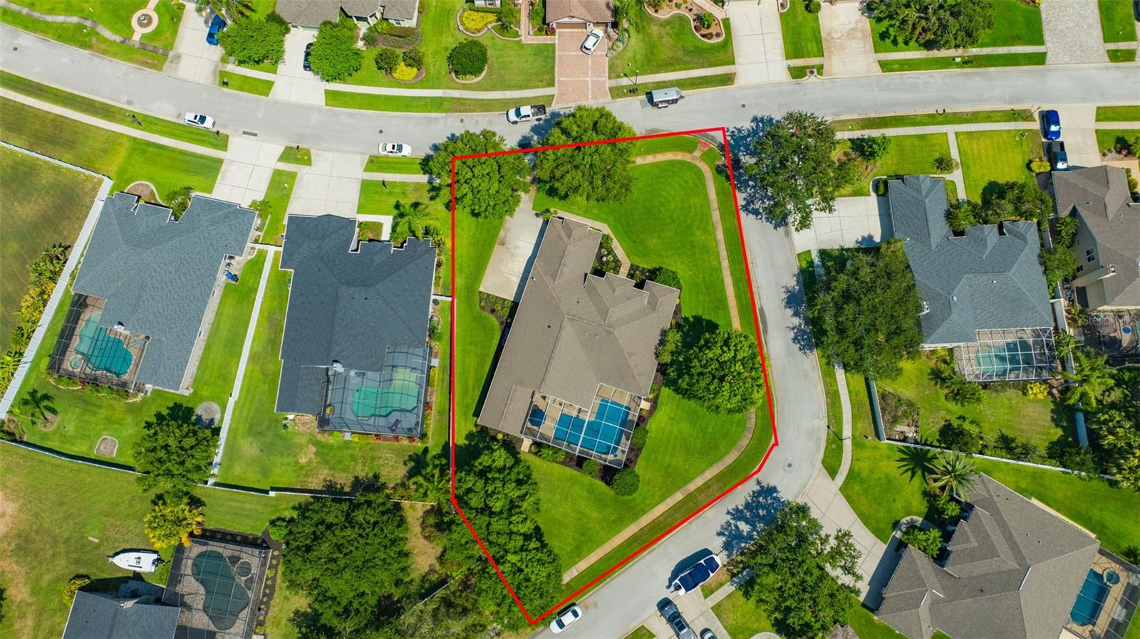 Huge Corner Lot w/ Meticulously Maintained & Lush Landscaping All Around!