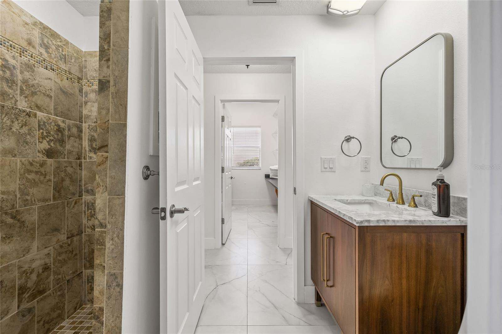 First floor bathroom with view of the shower.