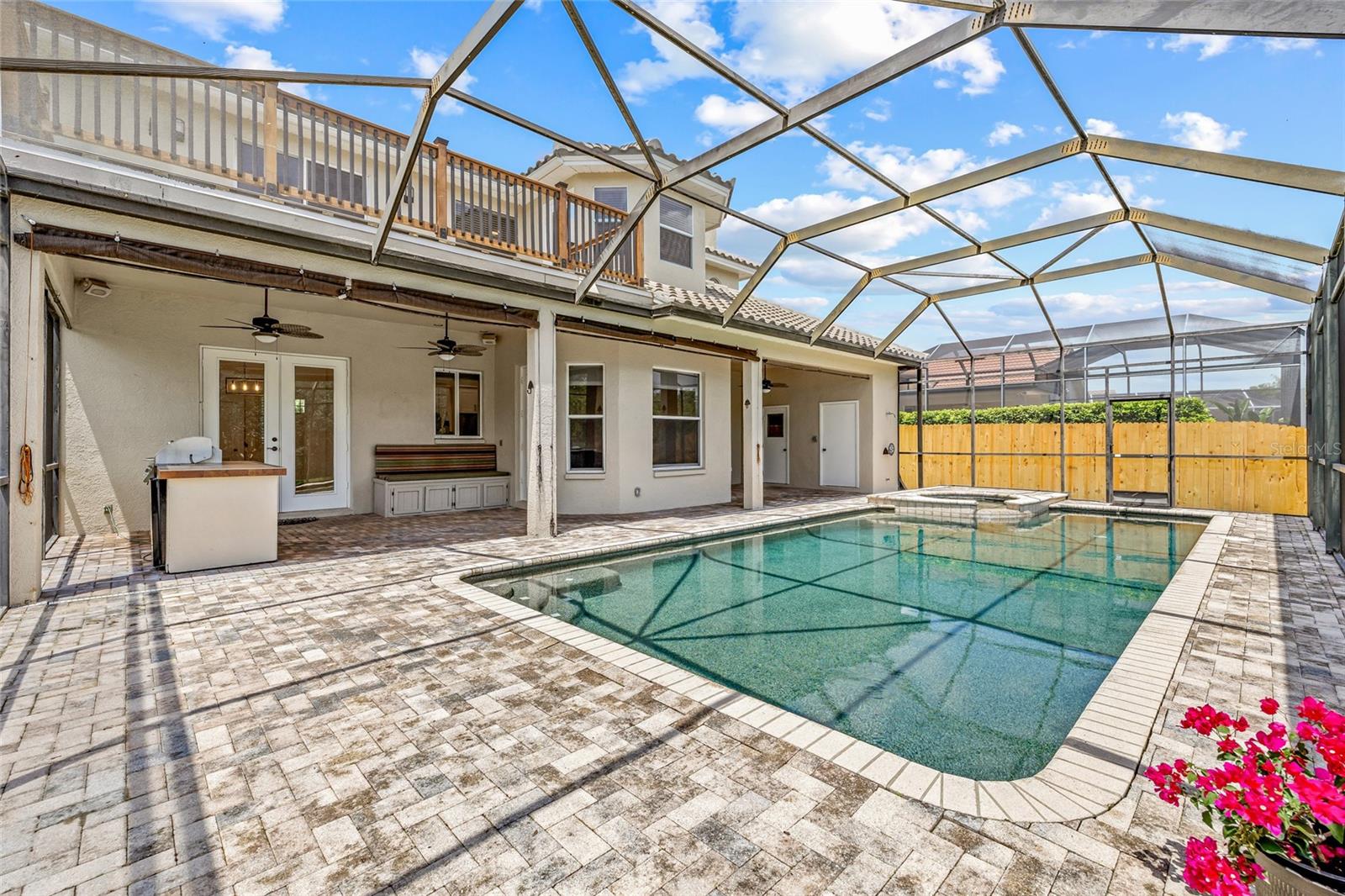Elevated screened lanai keeps the pool clear with still feeling spacious.