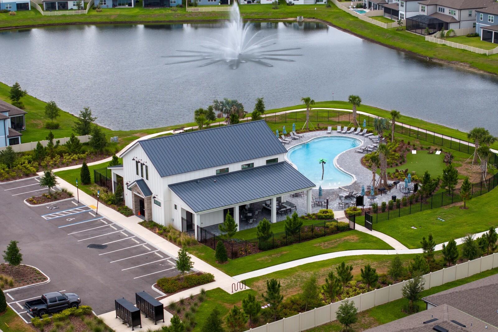 Clubhouse with pool and parking