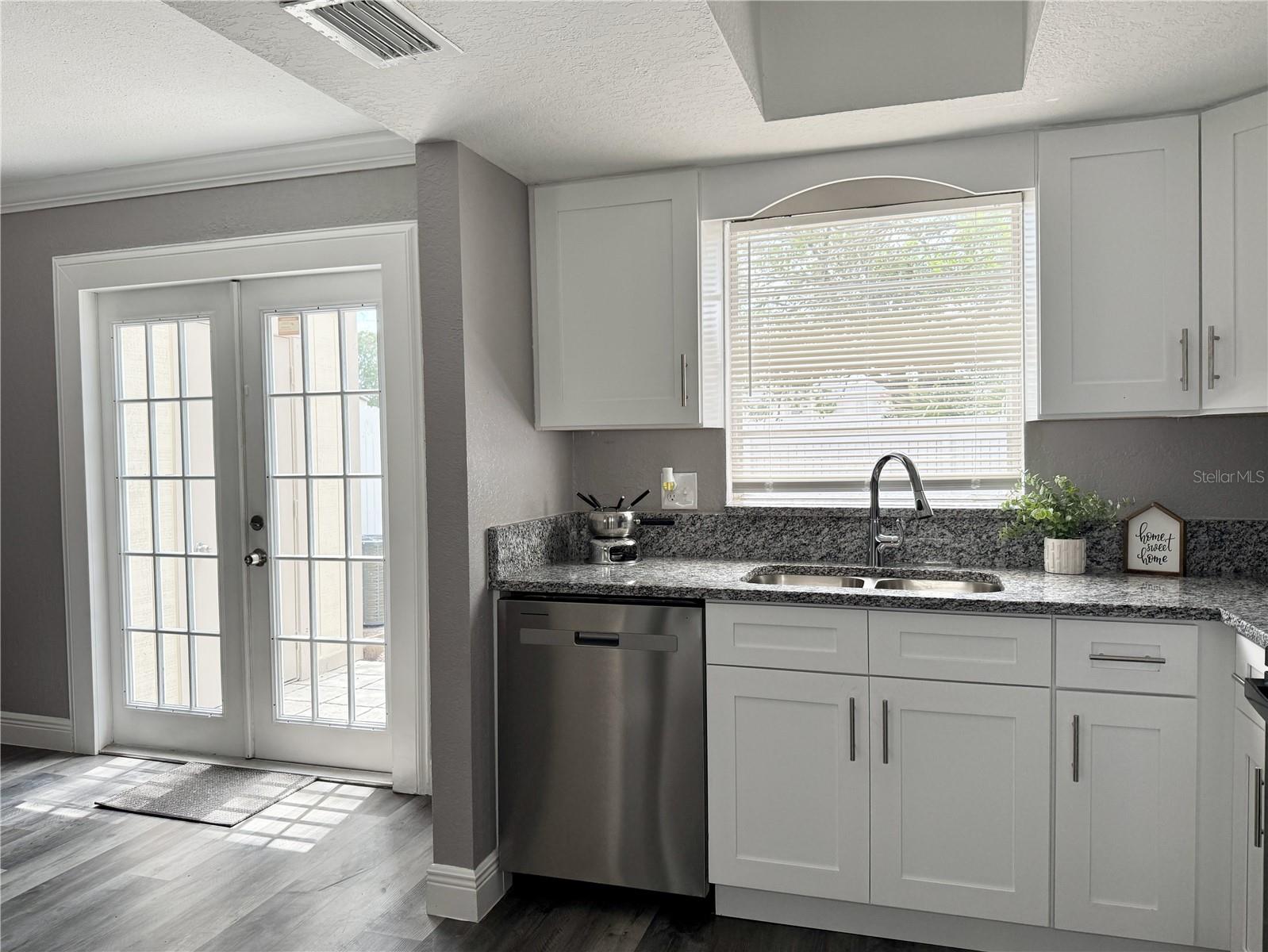 Kitchen - Updated Cabinets and Granite Counter Tops