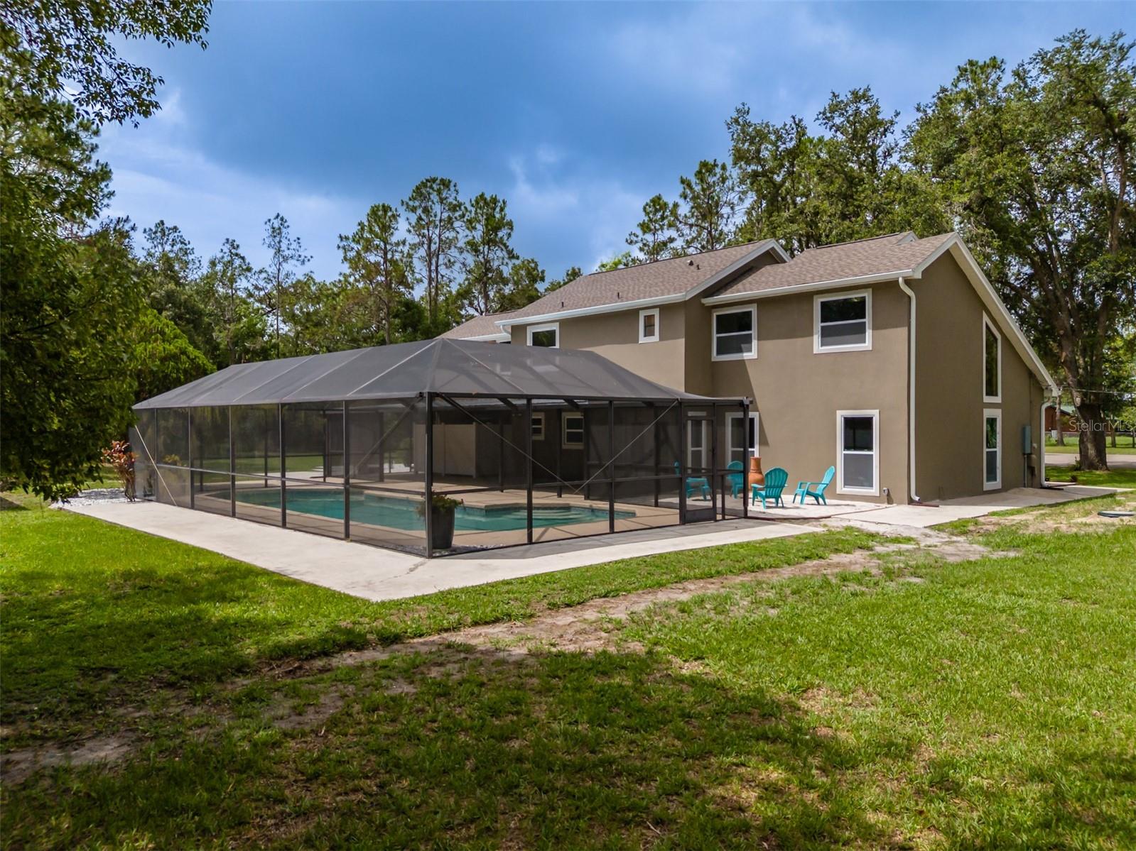 Back of main house w/ pool