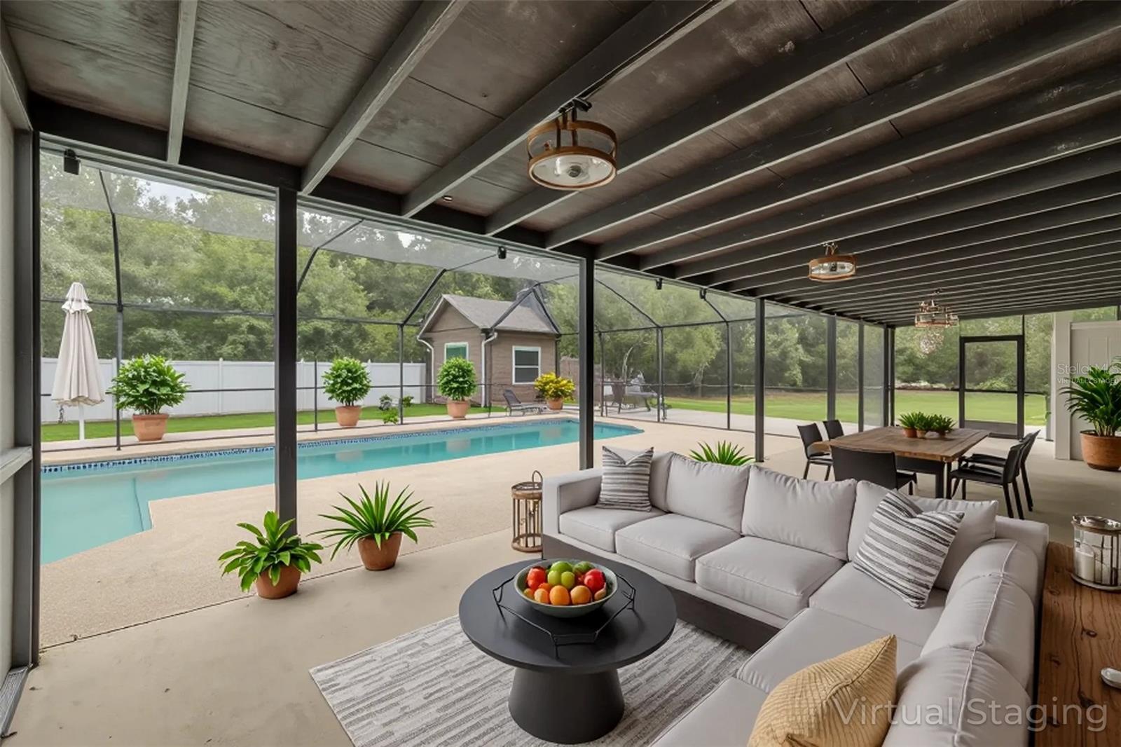 Covered Patio Pool Area - Virtually staged