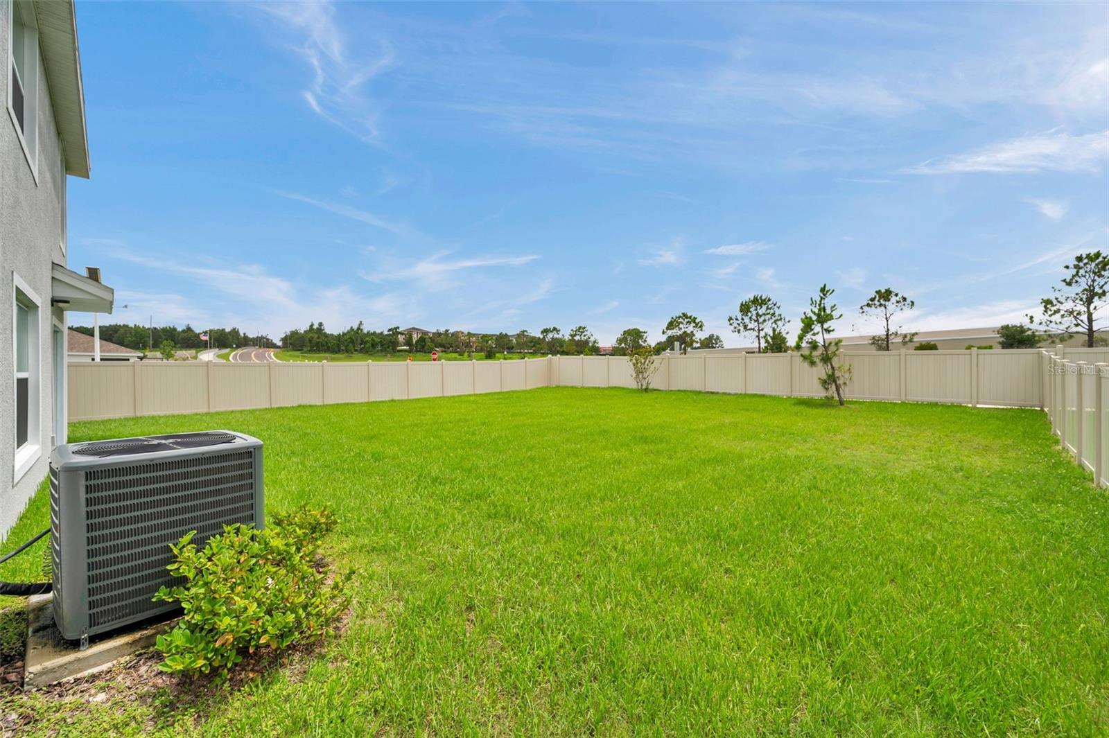 Fully fenced in, large lot.