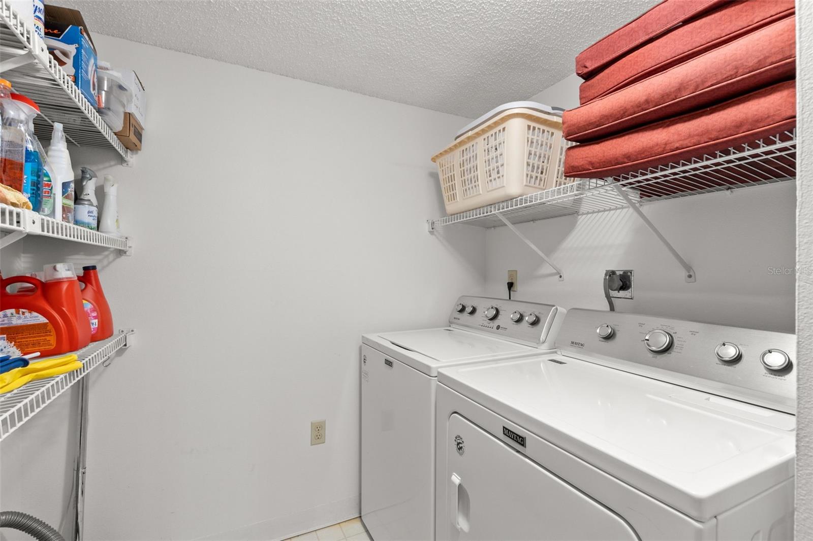 Laundry room with newer washer and dryer