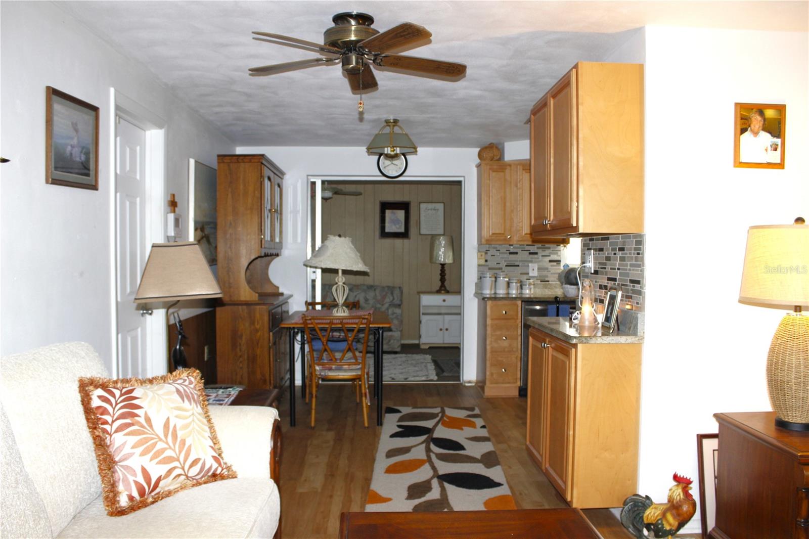 LIVING ROOM IN TH EMIDDLE DINING AND AT THE END FAMILY ROOM