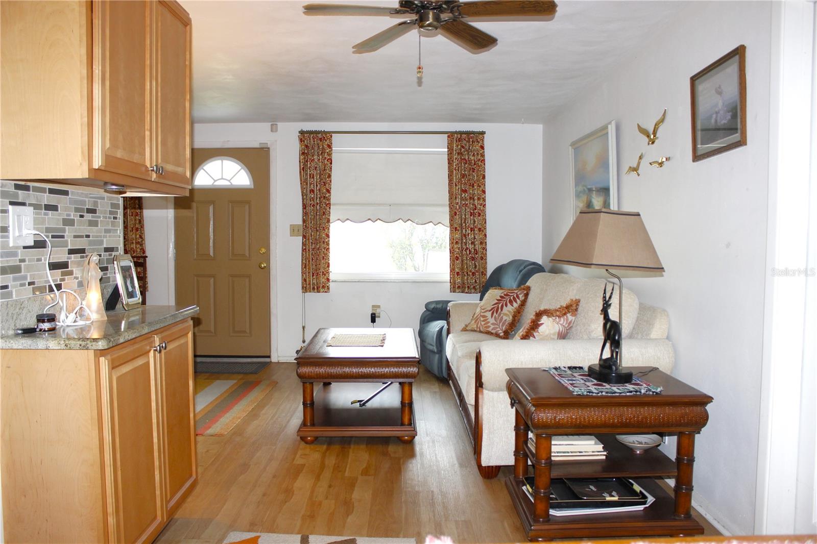 VIEW FROM DINING ROOM TO LIVING ROOM