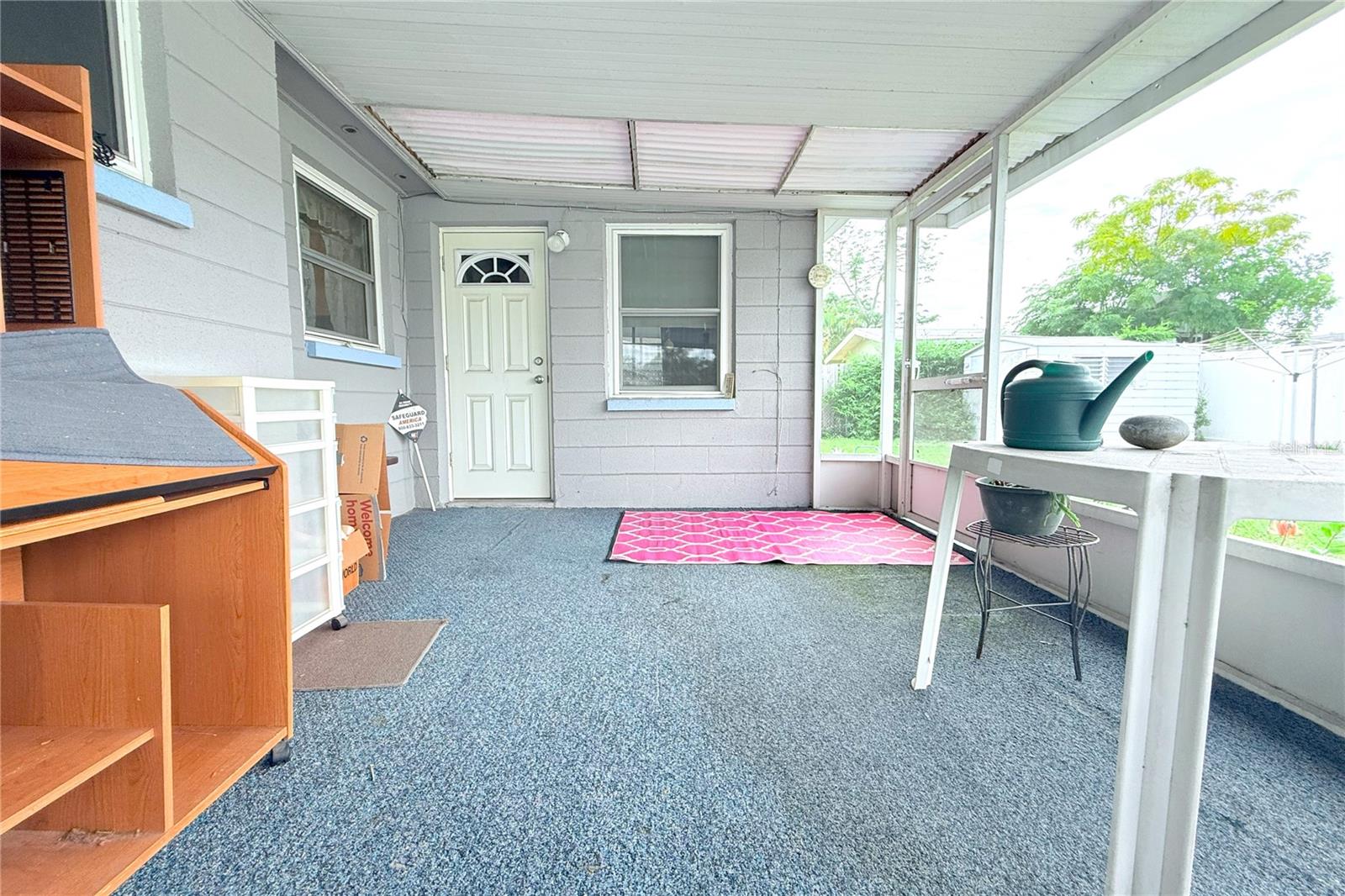 SCREENED LANAI WITH ACCESS TO BACK YARD