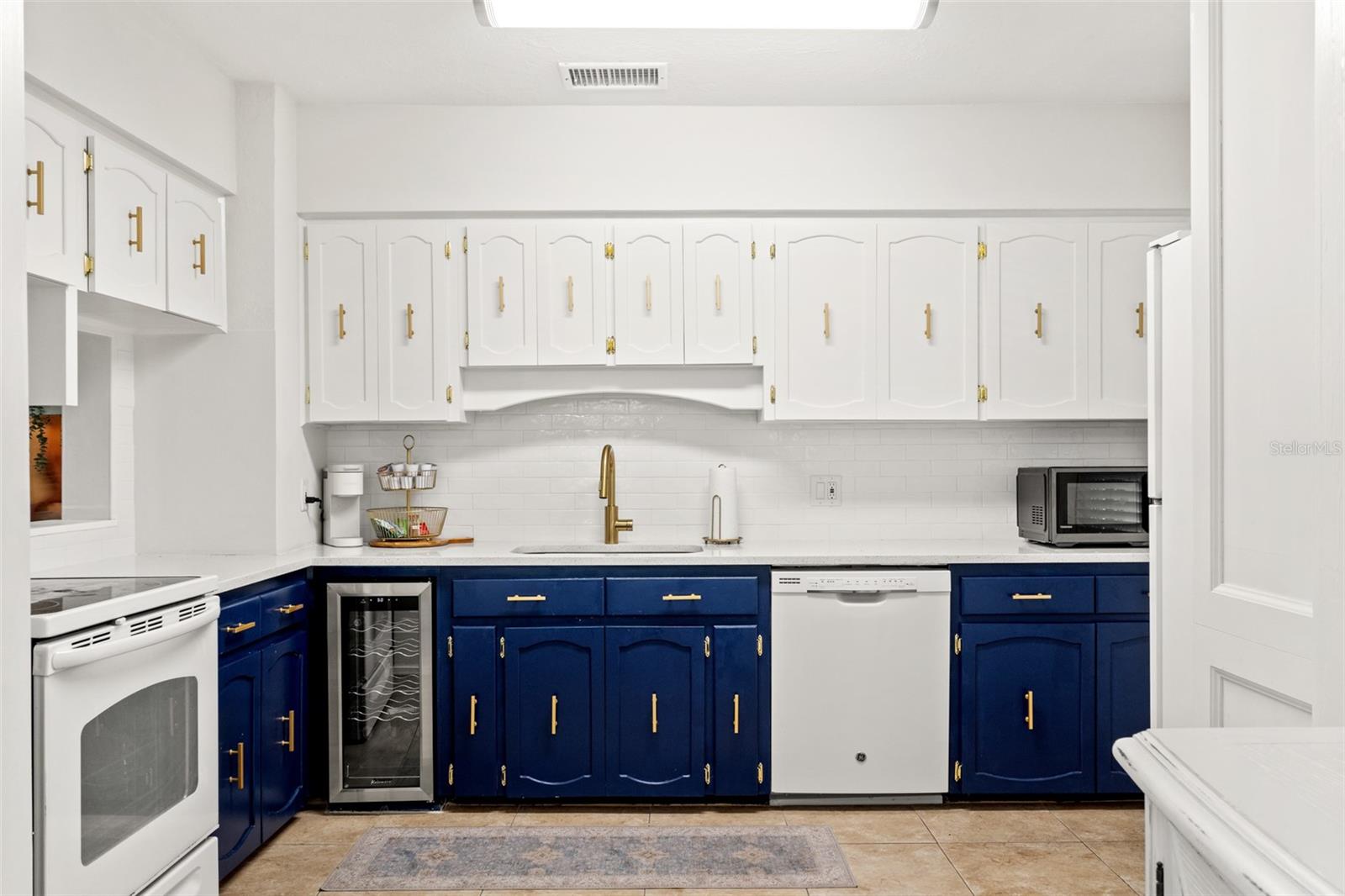 Updated Kitchen - Quartz, Backsplash, Sink, Fixtures