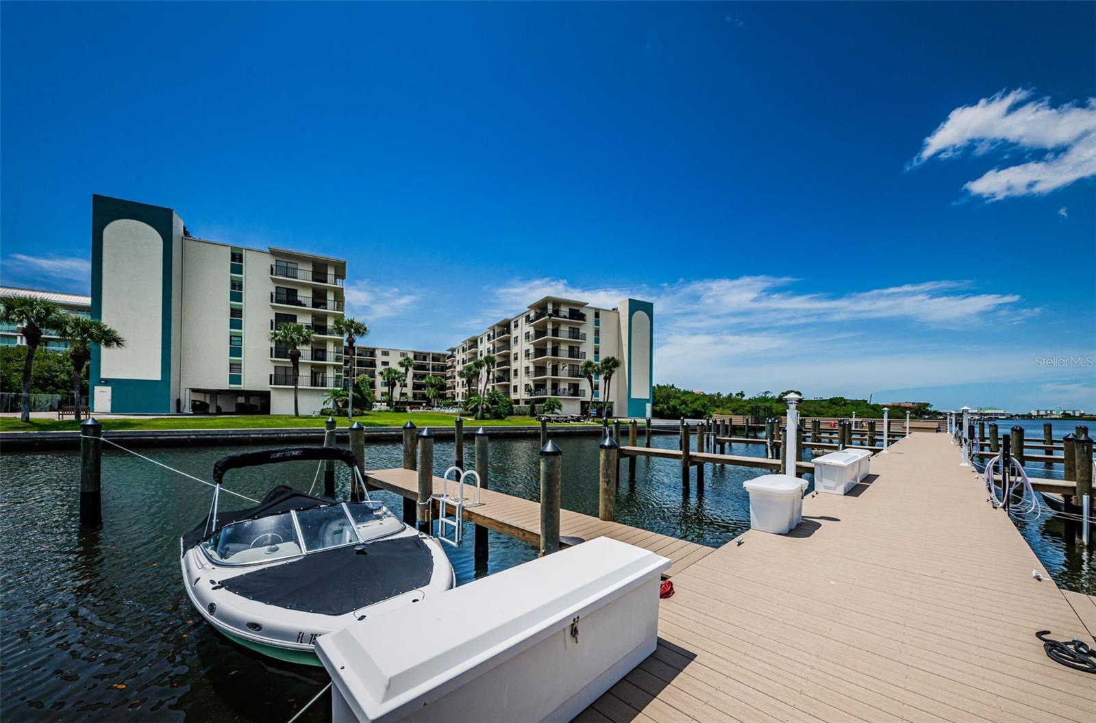 ... Looking East.. The Boat Docks were a 3 year Project from Designing - Permits - to Finished Product. Completed 2 years ago. 20 Slips with 10 Occupied and  Vacant Spots Ready to be Assigned.. No Charge ..Your Welcome to Throw a Pole in the Water and Bring Home some Dinner.