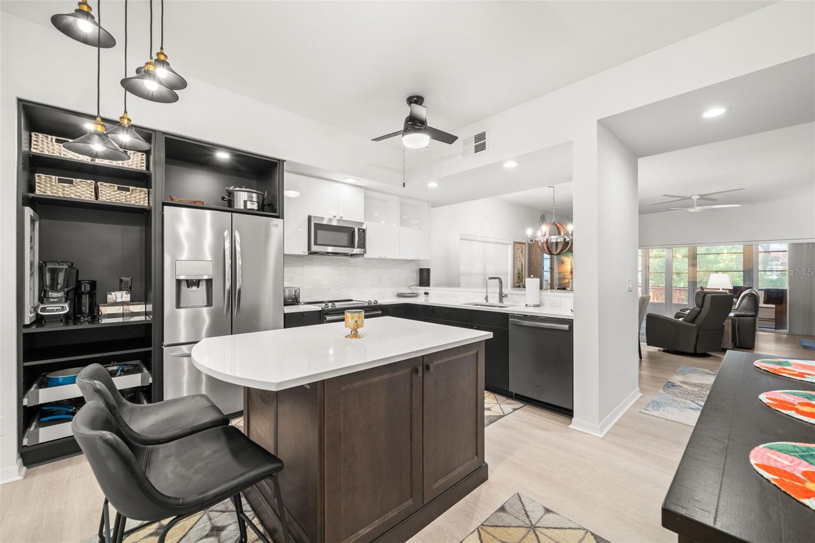 All newer appliances, newer luxury vinyl flooring quartz counter tops, custom lighting