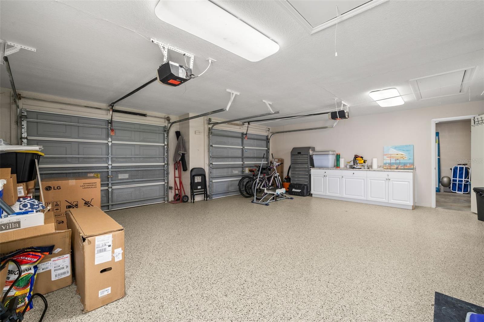Poly-coated flooring in the two-car garage.
