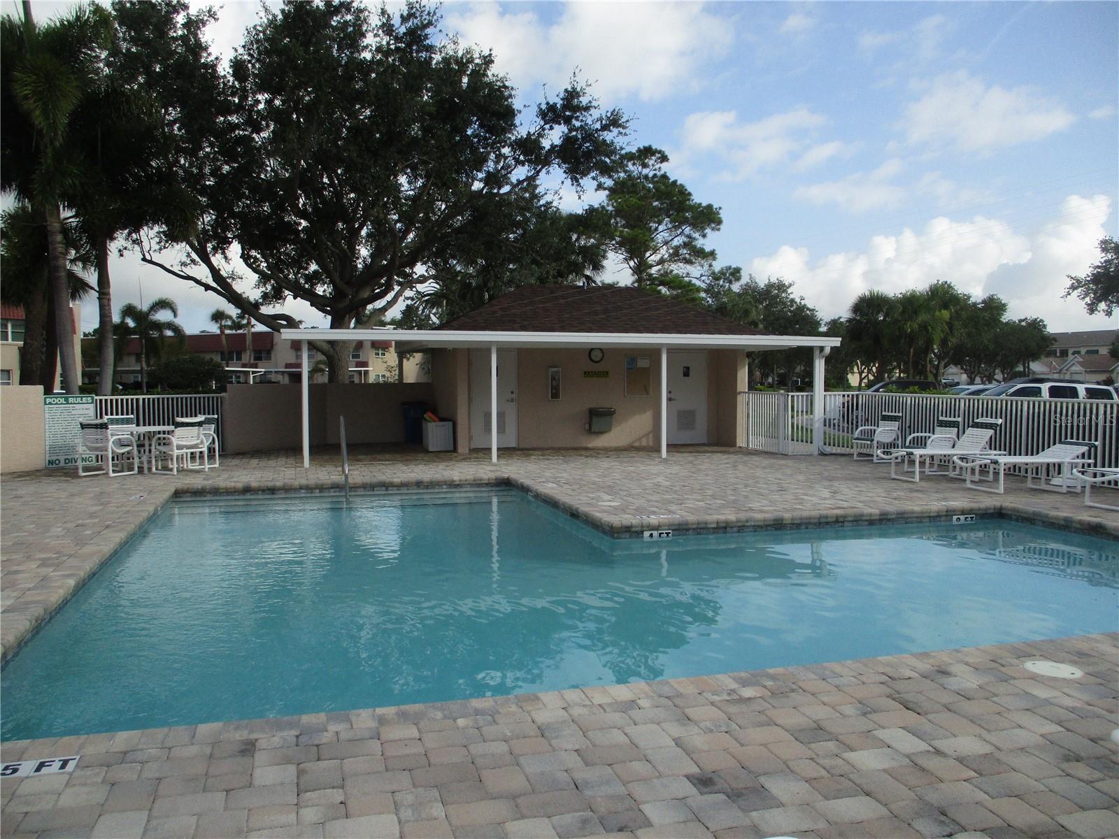 Heated pool located a few doors down from your condo.