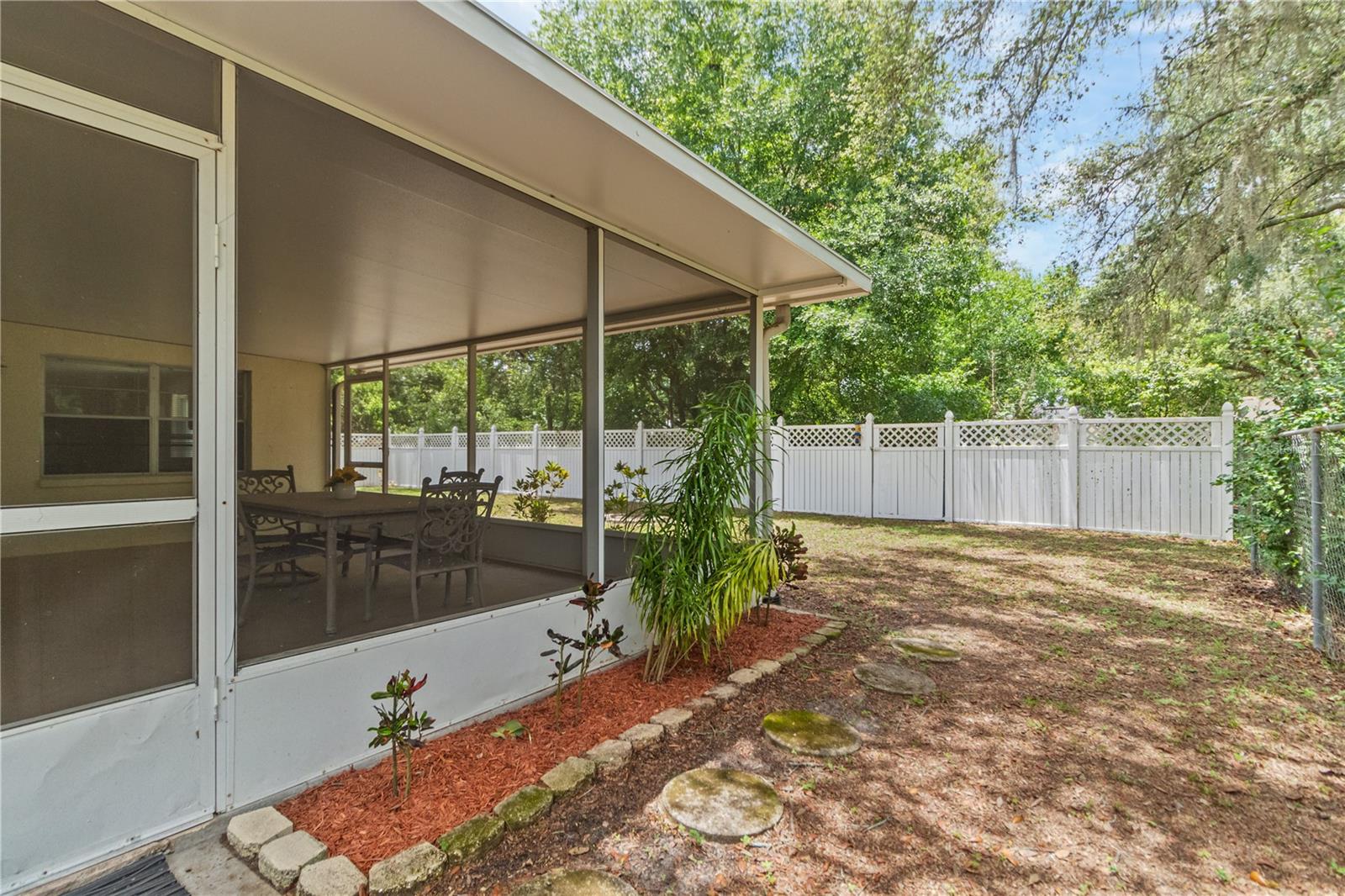 fenced in large backyard